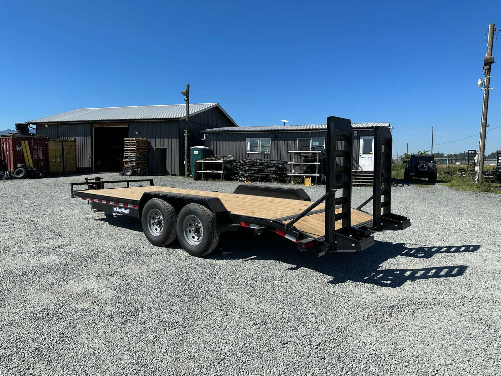 Photo of 2025 Suretrac 7x20 Equipment Trailer 14,000LB GVW Implement Flat Deck w/ Stand Up Ramps