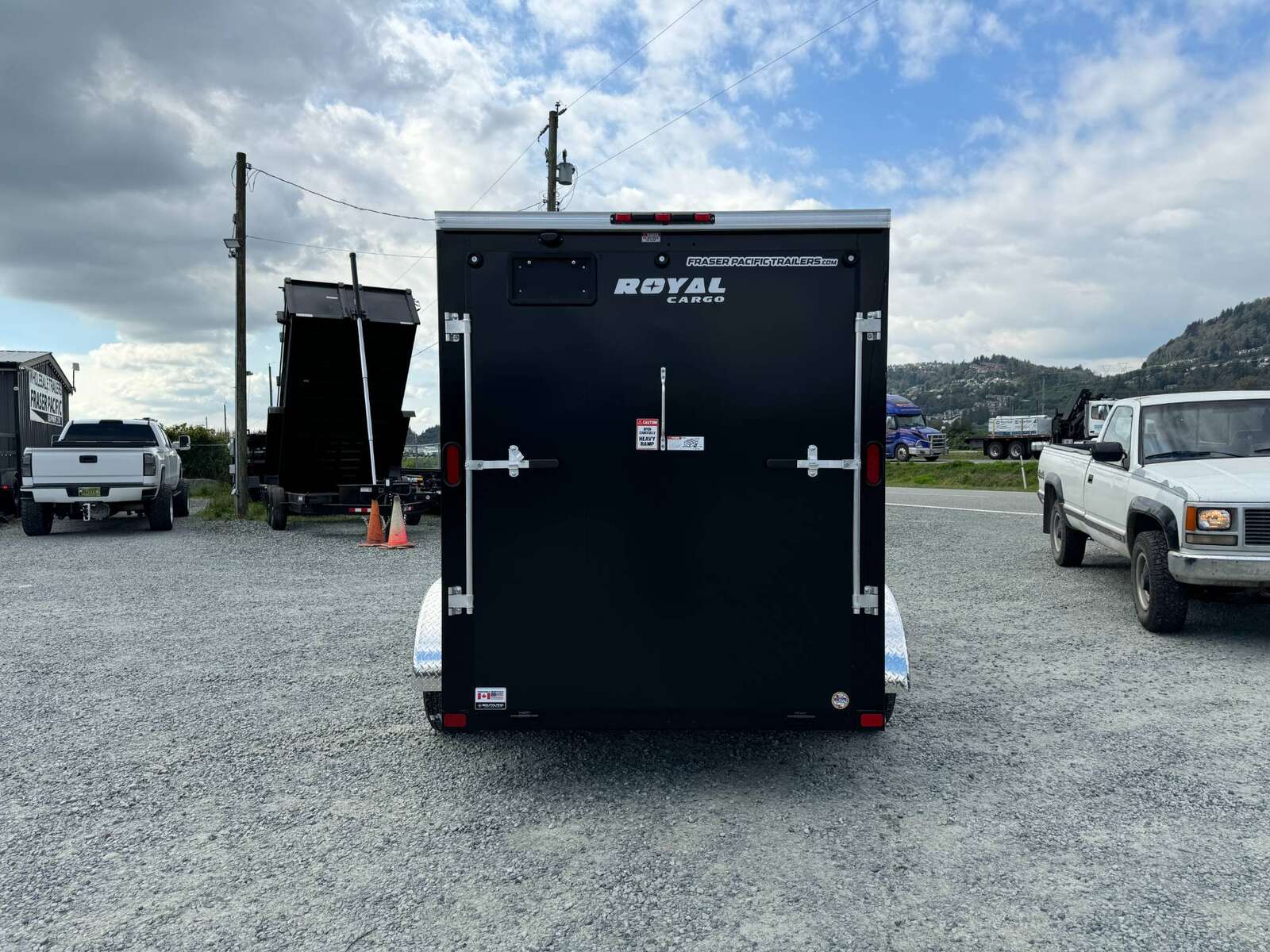 Photo of 2025 Royal Cargo 6x12 V Nose Cargo / Enclosed Trailer Ramp Door Black Tandem Axle 7700lb GVW