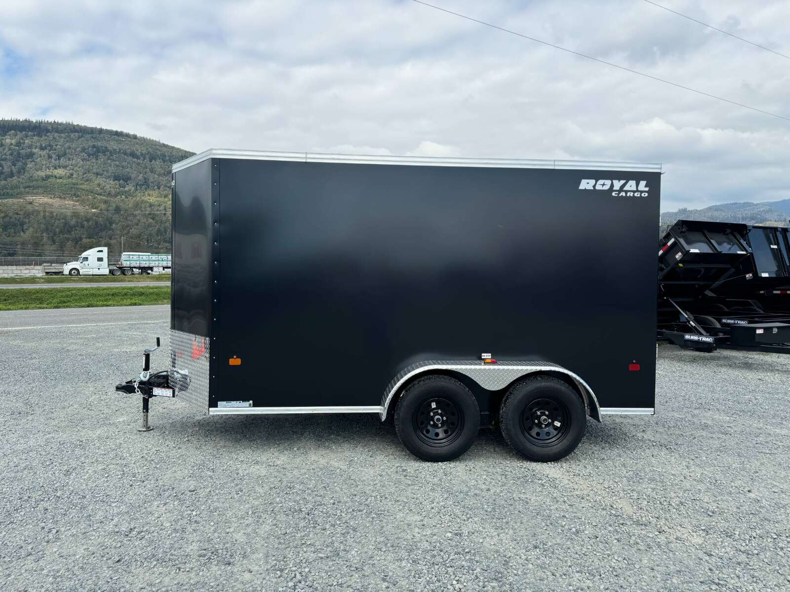 Photo of 2025 Royal Cargo 6x12 V Nose Cargo / Enclosed Trailer Ramp Door Black Tandem Axle 7700lb GVW