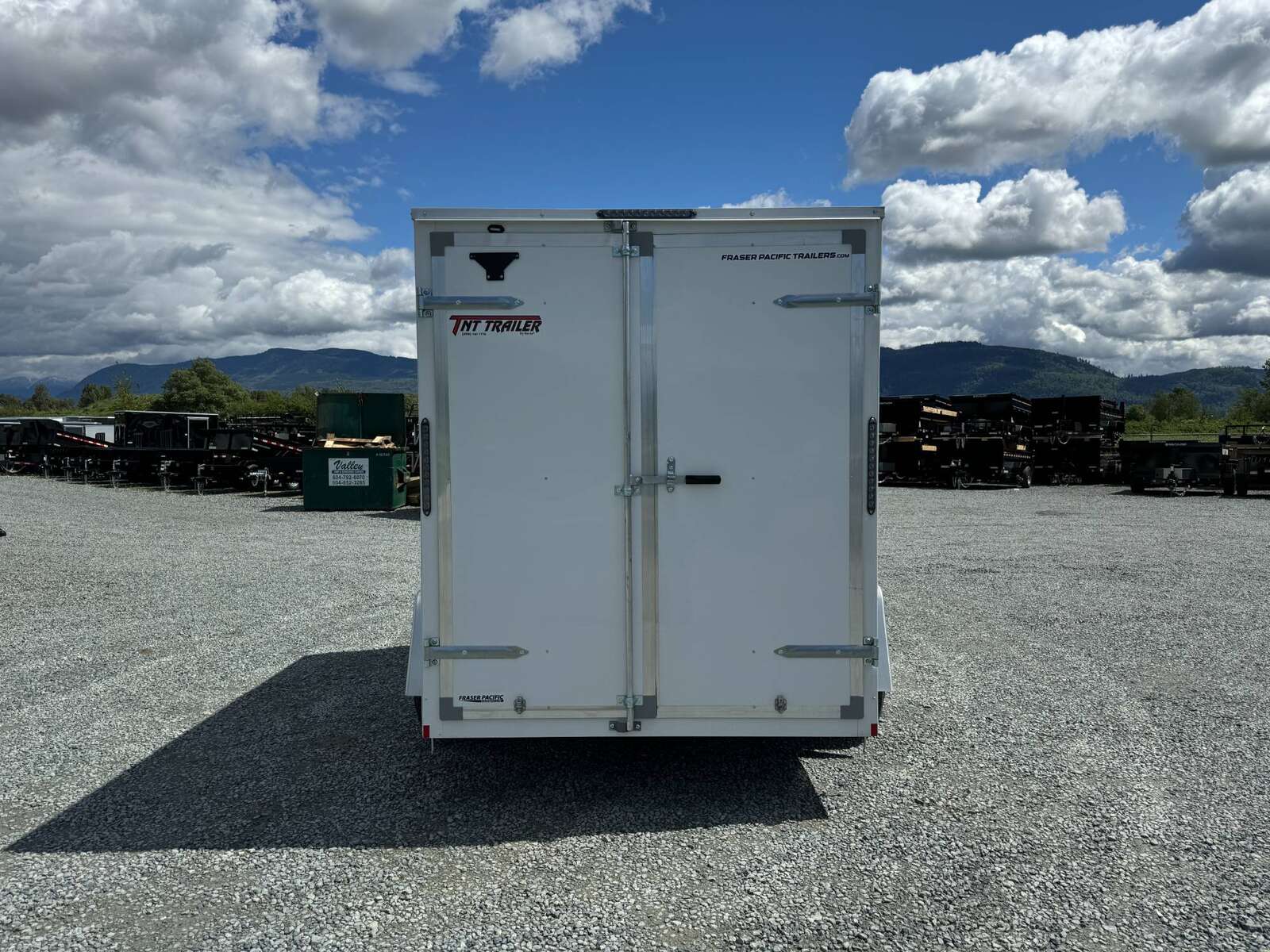 Photo of 2025 Mirage XE 6x10 V Nose Enclosed Cargo Trailer Barn Doors White Extra Height 2990lb GVW