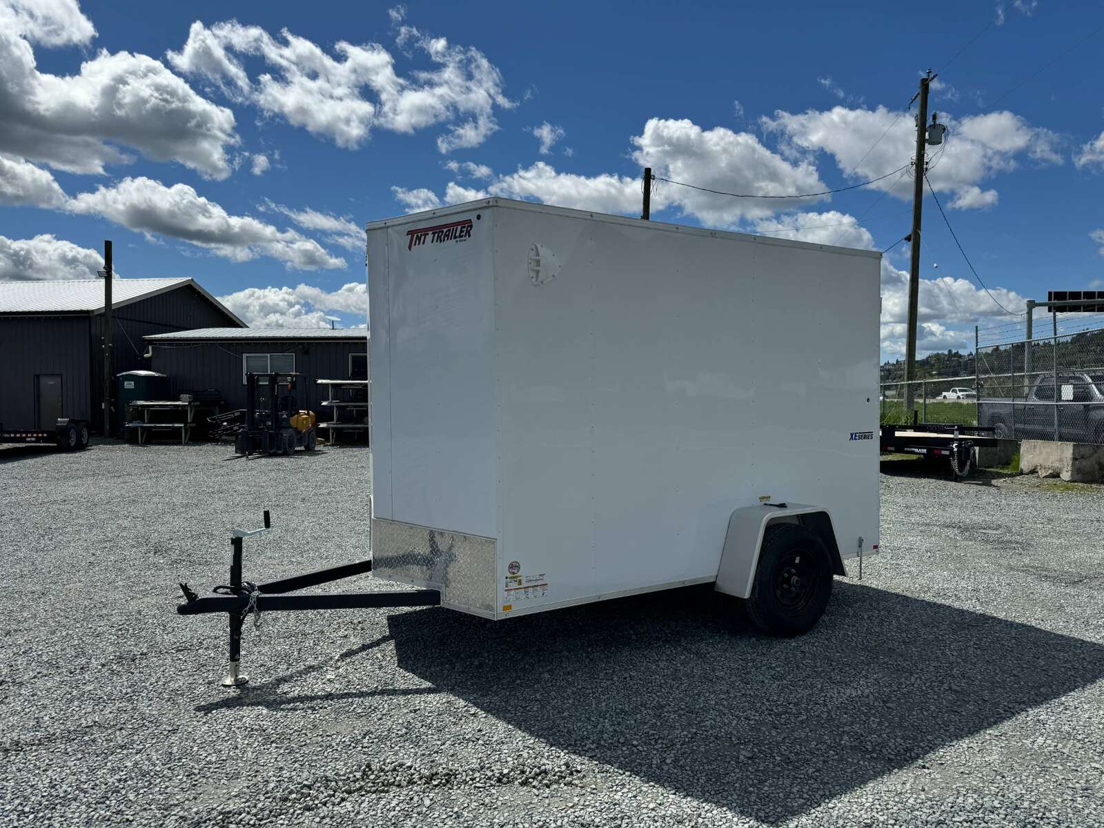 Photo of 2025 Mirage XE 6x10 V Nose Enclosed Cargo Trailer Barn Doors White Extra Height 2990lb GVW