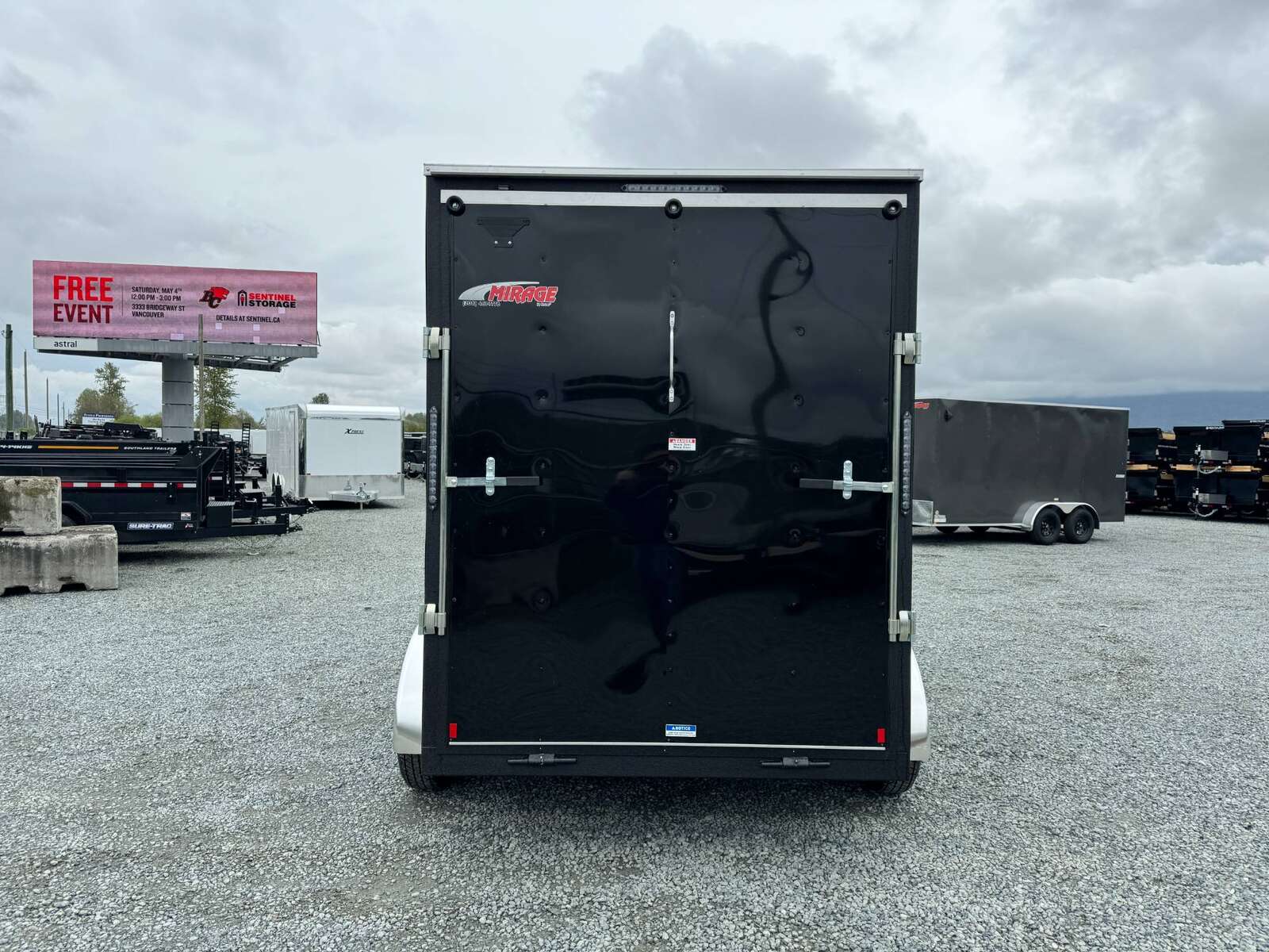 Photo of 2025 Mirage XE 6x12 V Nose Tandem Axle Cargo / Enclosed Trailer Black Ramp Door 77 Inch Interior Height 7,000lb GVW