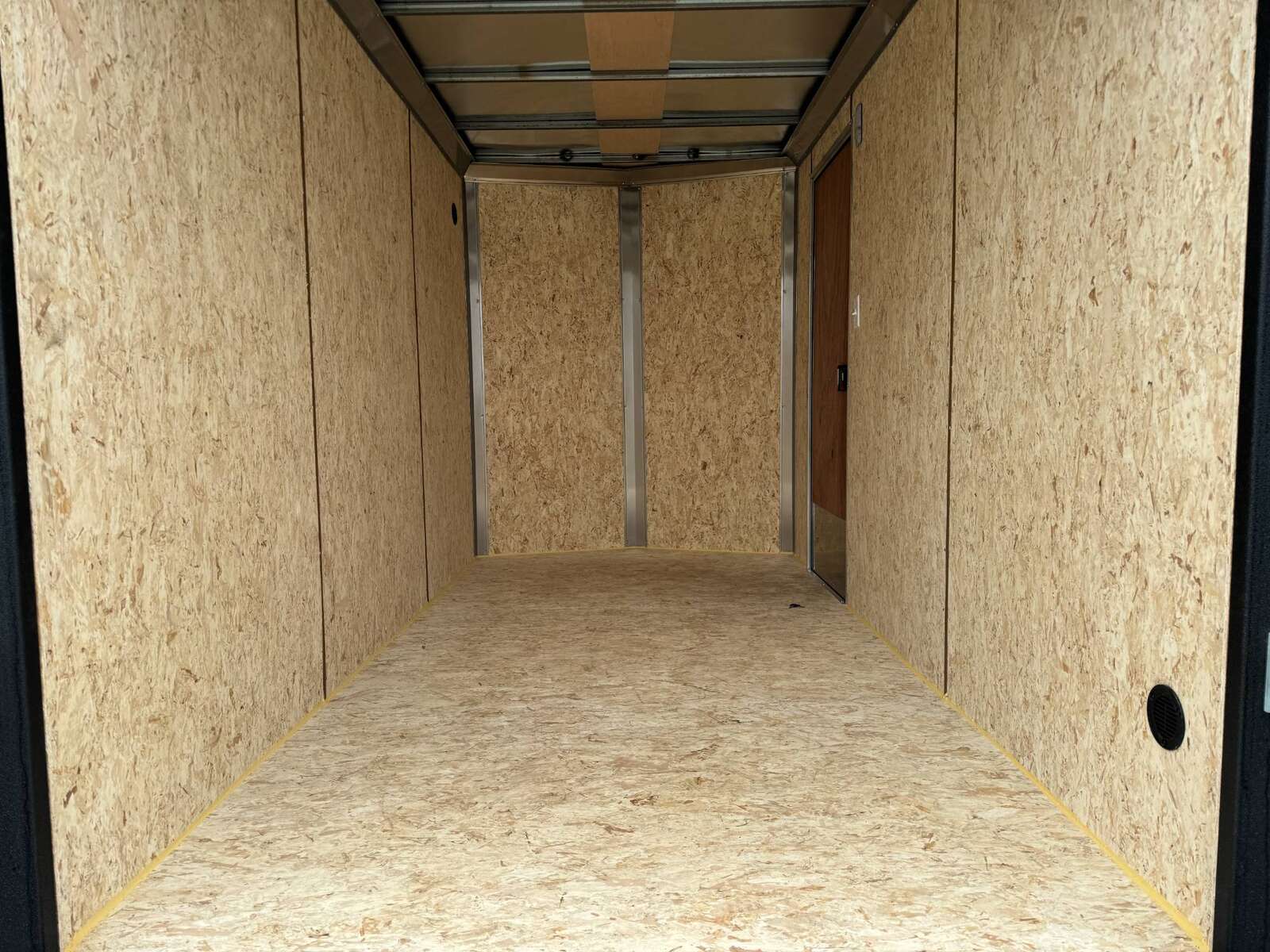 Photo of 2025 Mirage XE 6x12 V Nose Tandem Axle Cargo / Enclosed Trailer Black Ramp Door 77 Inch Interior Height 7,000lb GVW