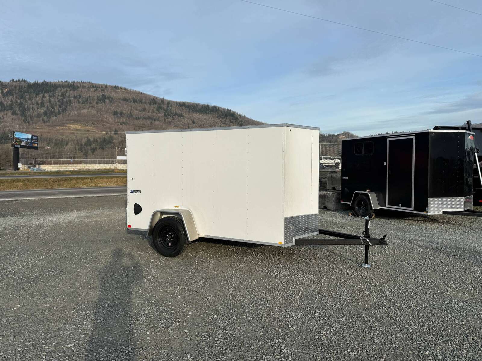 Photo of 2025 Mirage XE 5x10 V Nose Cargo / Enclosed Trailer White Barn Door 2990lb GVW