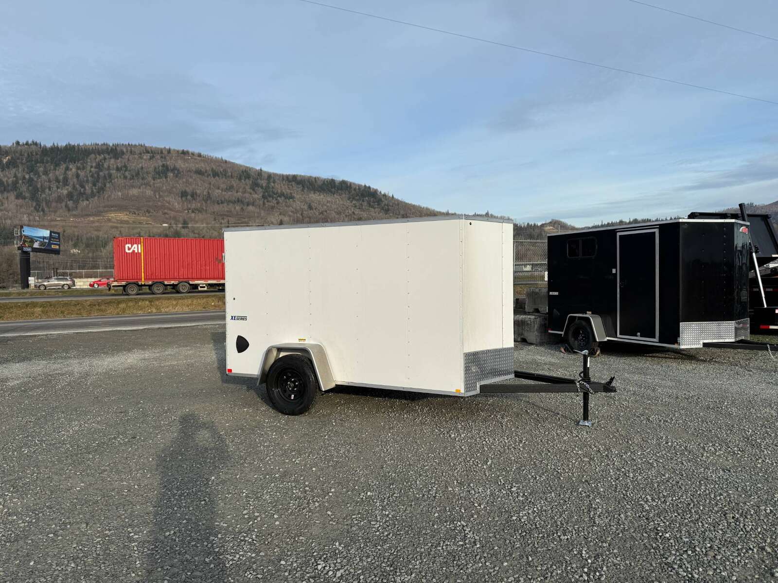 Photo of 2025 Mirage XE 5x10 V Nose Cargo / Enclosed Trailer White Barn Door 2990lb GVW