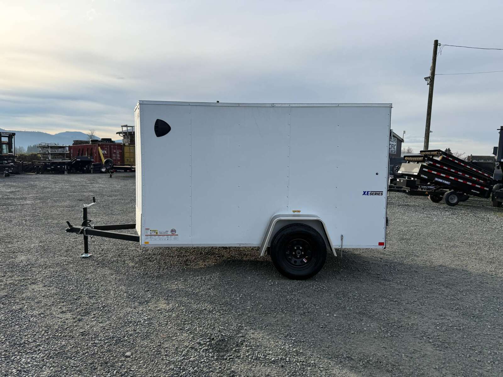 Photo of 2025 Mirage XE 5x10 V Nose Cargo / Enclosed Trailer White Barn Door 2990lb GVW