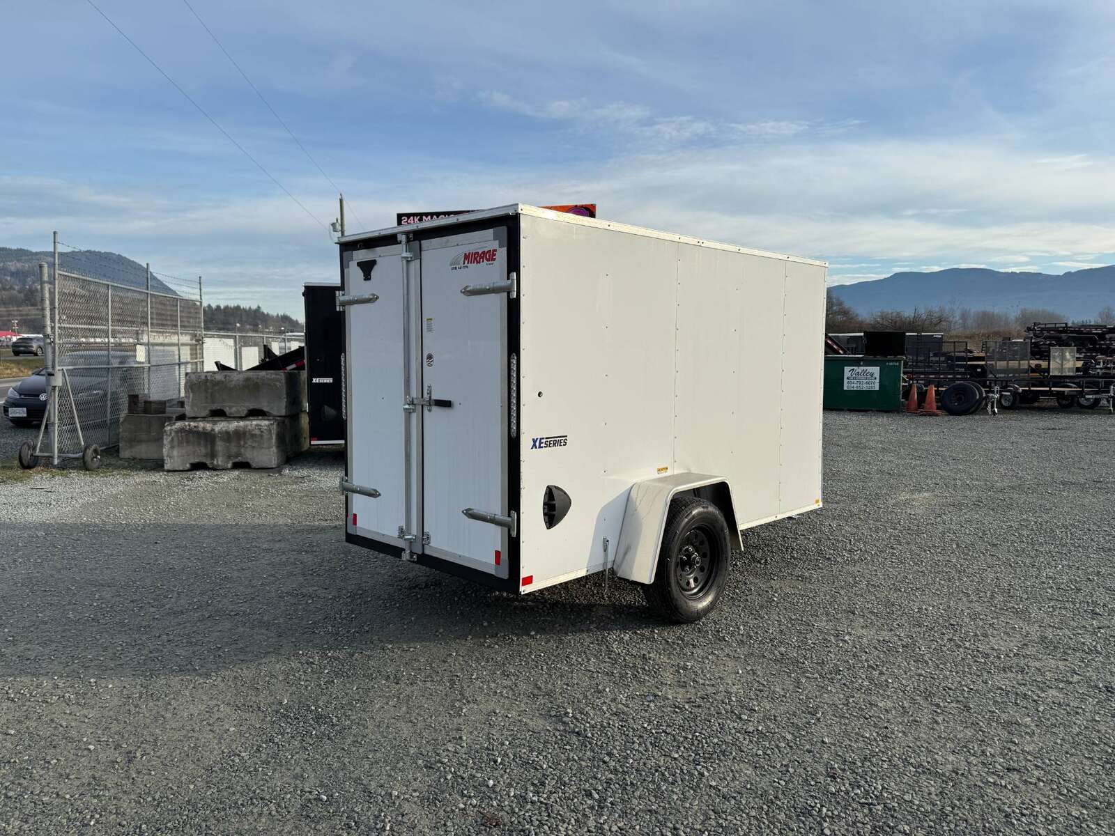 Photo of 2025 Mirage XE 5x10 V Nose Cargo / Enclosed Trailer White Barn Door 2990lb GVW