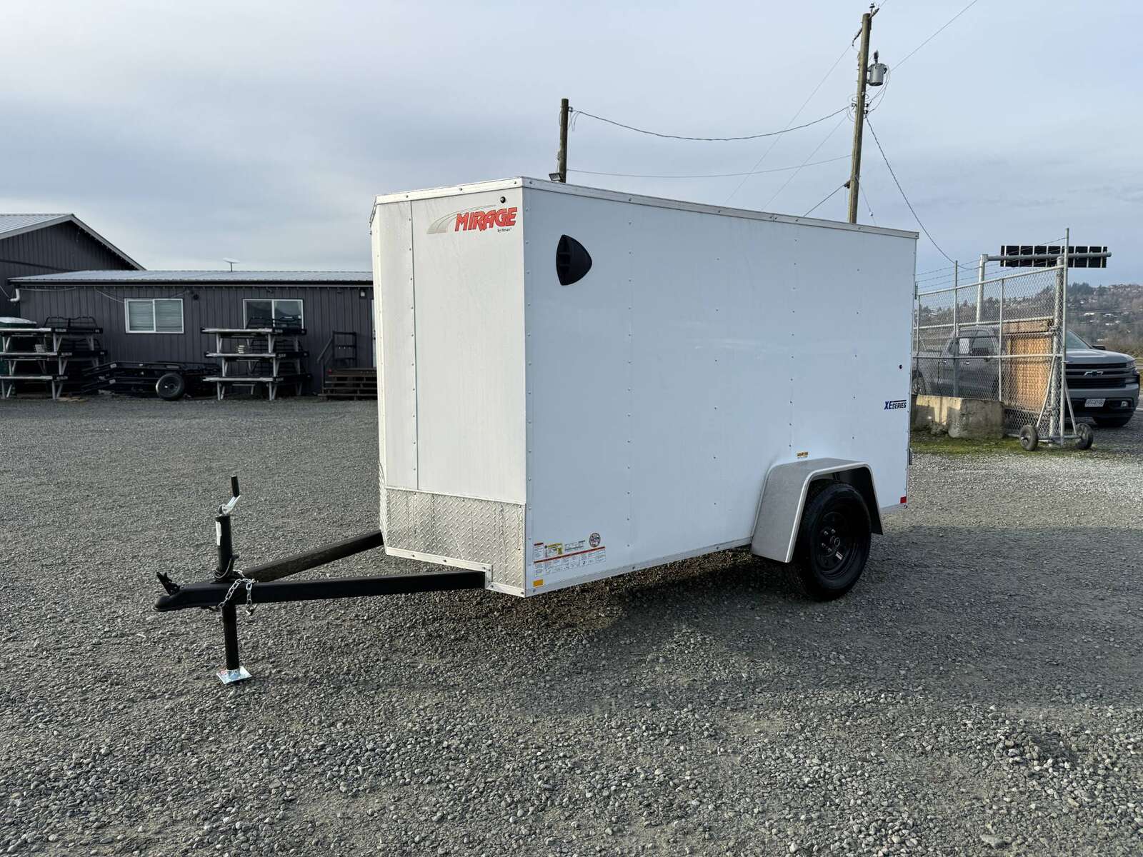 Photo of 2025 Mirage XE 5x10 V Nose Cargo / Enclosed Trailer White Barn Door 2990lb GVW