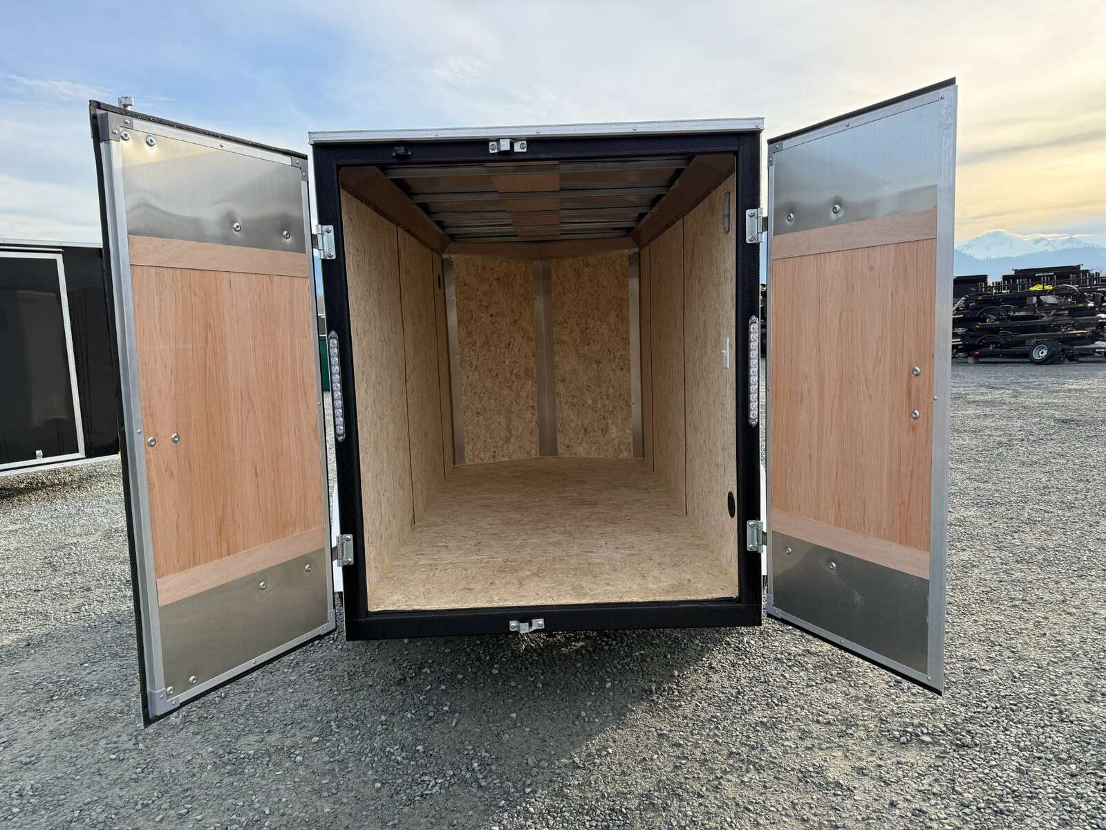 Photo of 2025 Mirage XE 5x10 V Nose Cargo / Enclosed Trailer White Barn Door 2990lb GVW