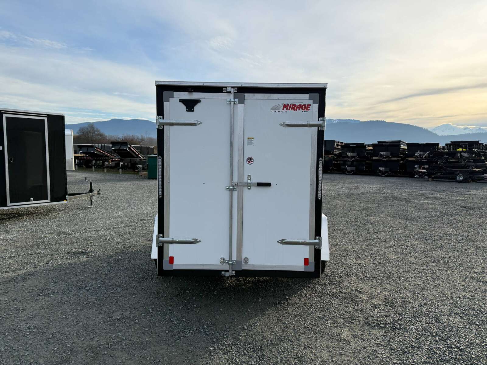 Photo of 2025 Mirage XE 5x10 V Nose Cargo / Enclosed Trailer White Barn Door 2990lb GVW