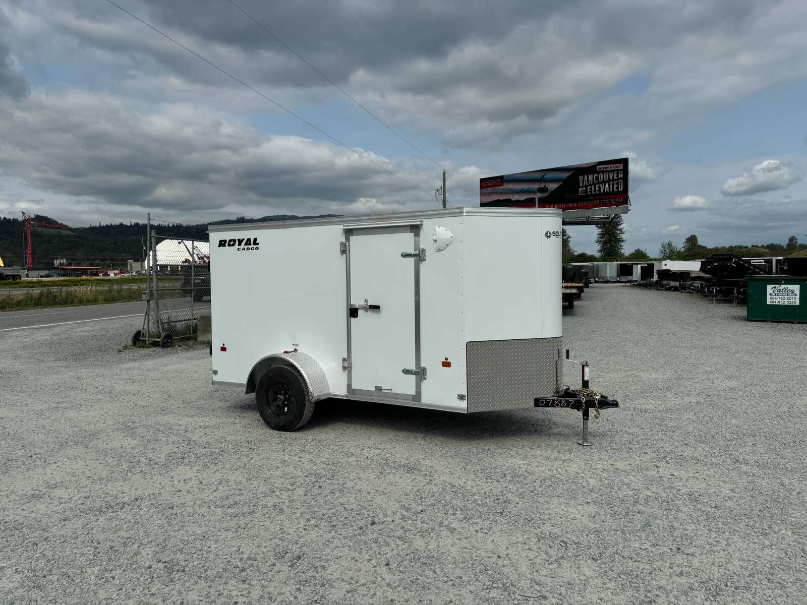 Photo of 2025 Royal Cargo 5x10 Cargo Enclosed Trailer V Nose Barn Doors White Side Door