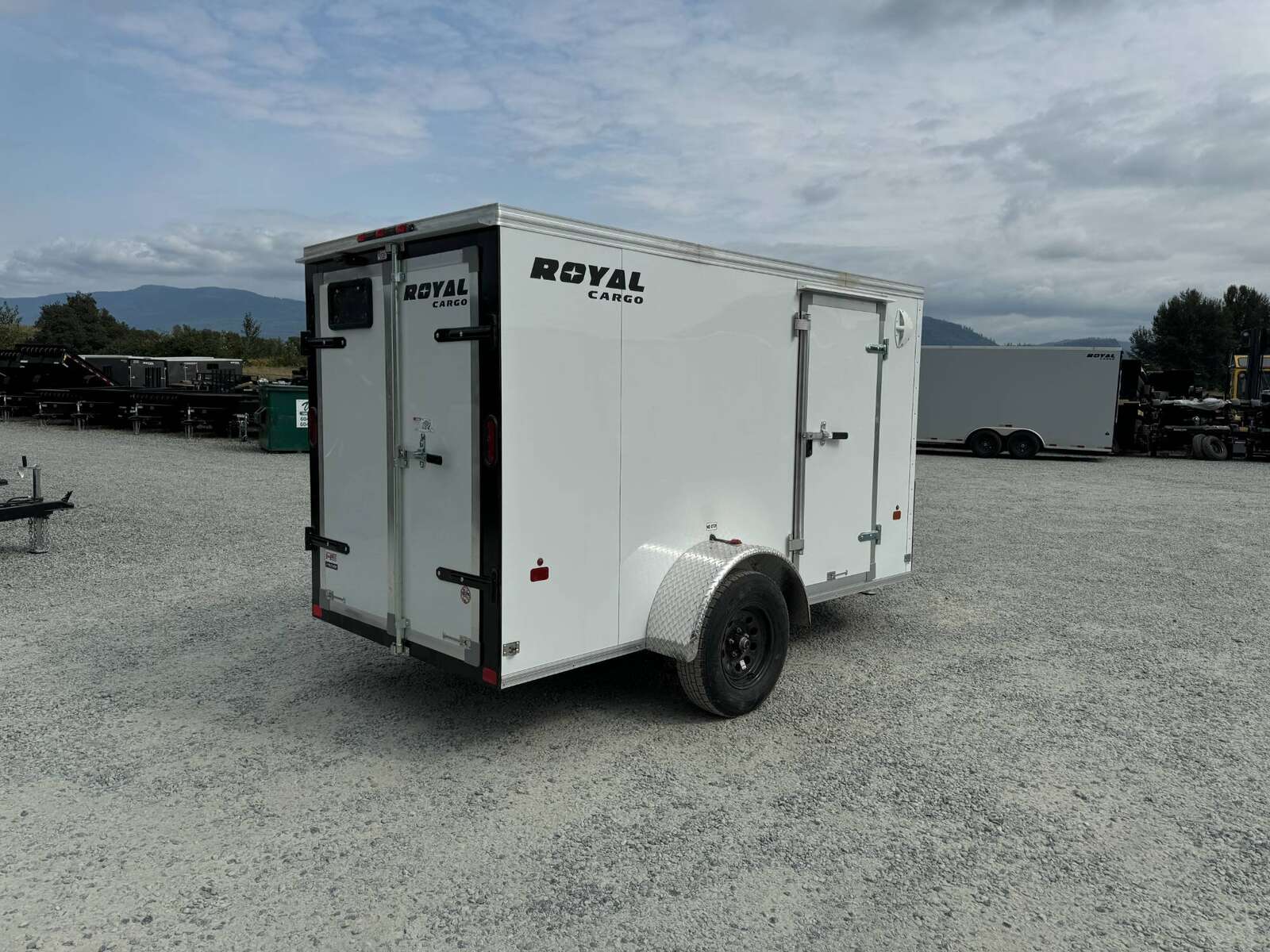 Photo of 2025 Royal Cargo 5x10 Cargo Enclosed Trailer V Nose Barn Doors White Side Door