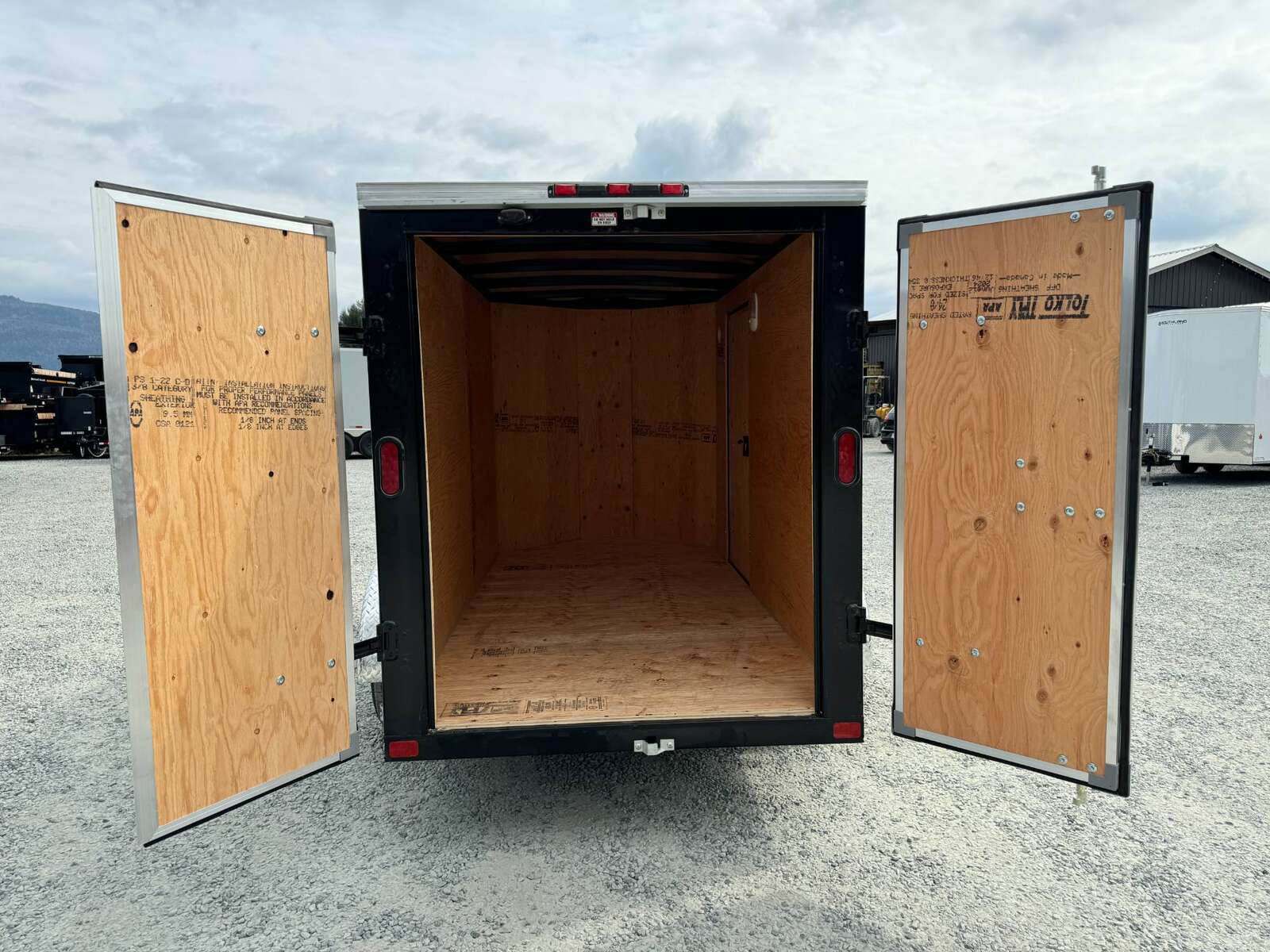 Photo of 2025 Royal Cargo 5x10 Cargo Enclosed Trailer V Nose Barn Doors White Side Door