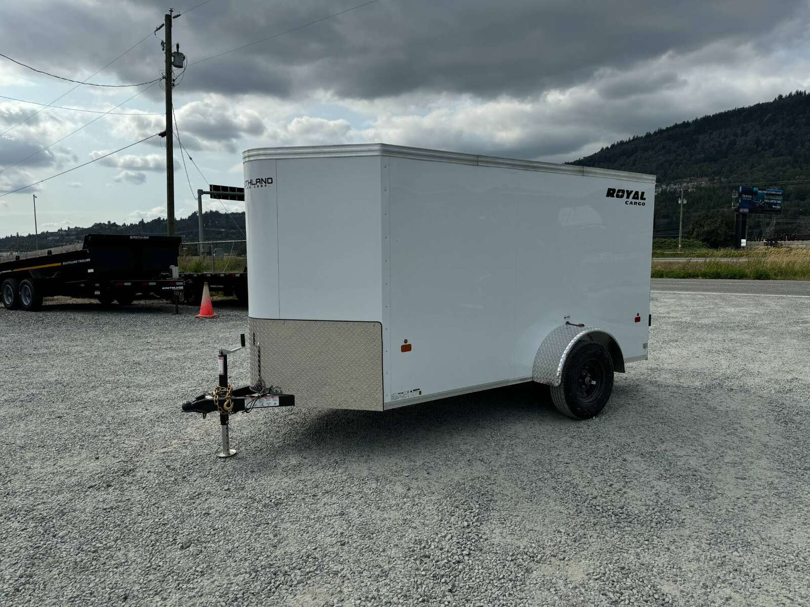 Photo of 2025 Royal Cargo 5x10 Cargo Enclosed Trailer V Nose Barn Doors White Side Door