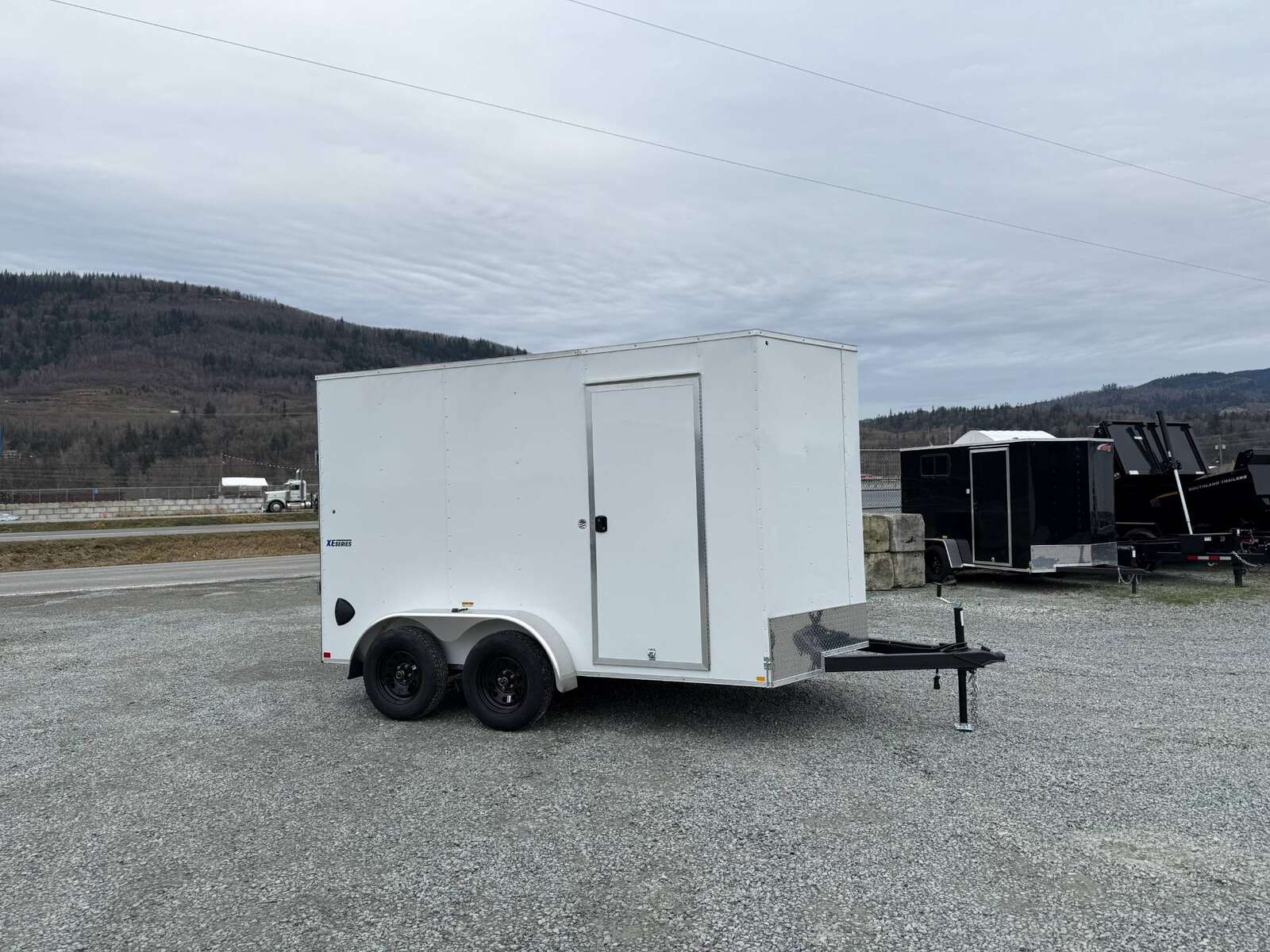 Photo of 2025 Mirage XE 7X12 V-Nose Ramp Door Cargo / Enclosed Trailer Extra Height White 7000lb GVW