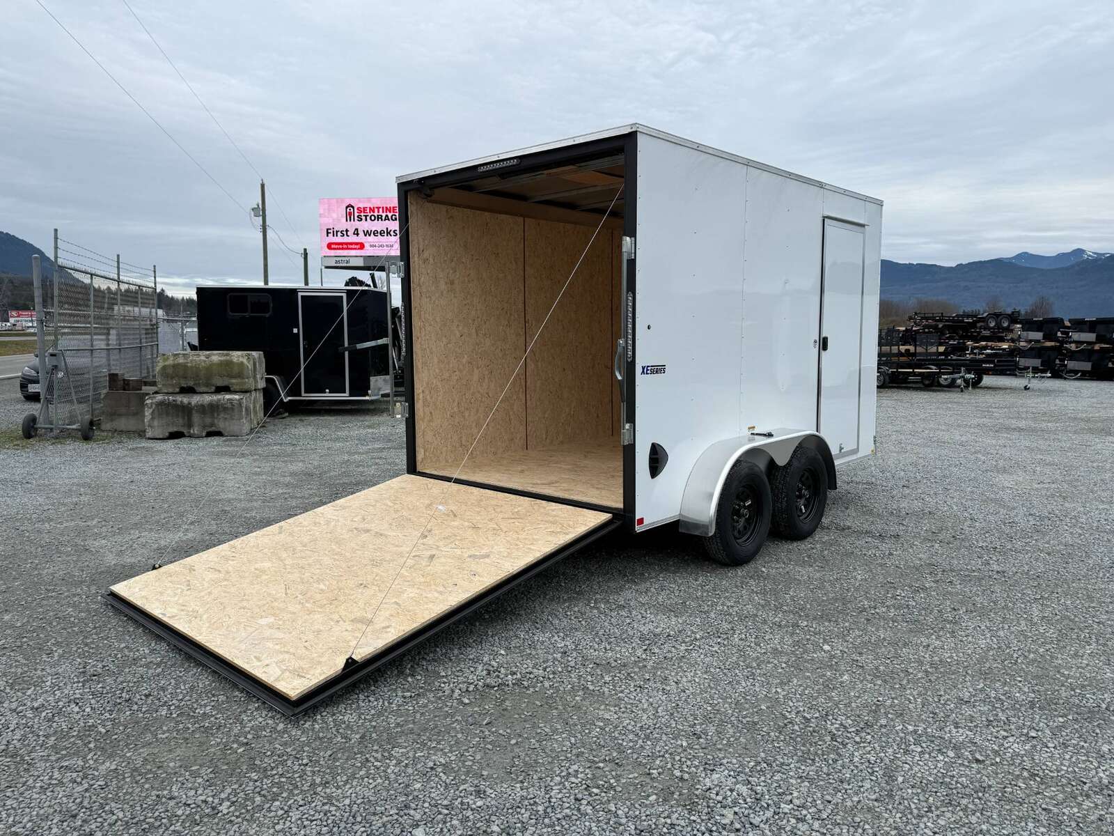 Photo of 2025 Mirage XE 7X12 V-Nose Ramp Door Cargo / Enclosed Trailer Extra Height White 7000lb GVW