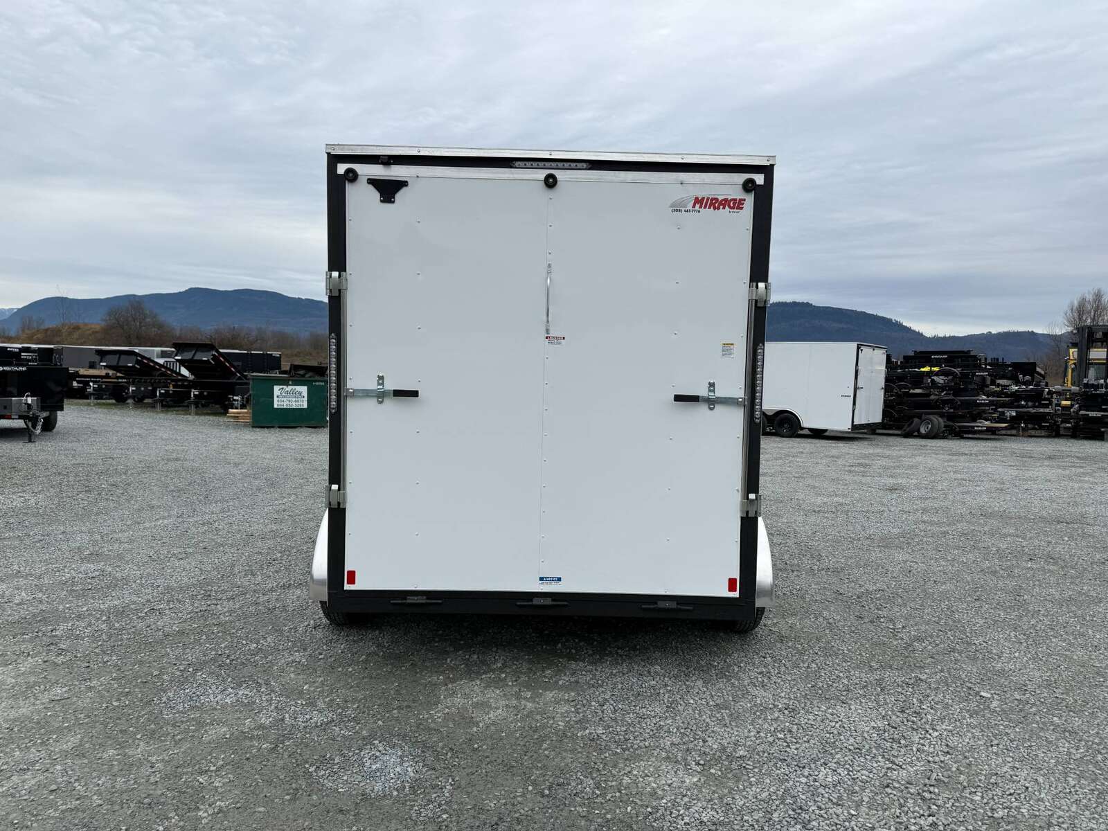 Photo of 2025 Mirage XE 7X12 V-Nose Ramp Door Cargo / Enclosed Trailer Extra Height White 7000lb GVW