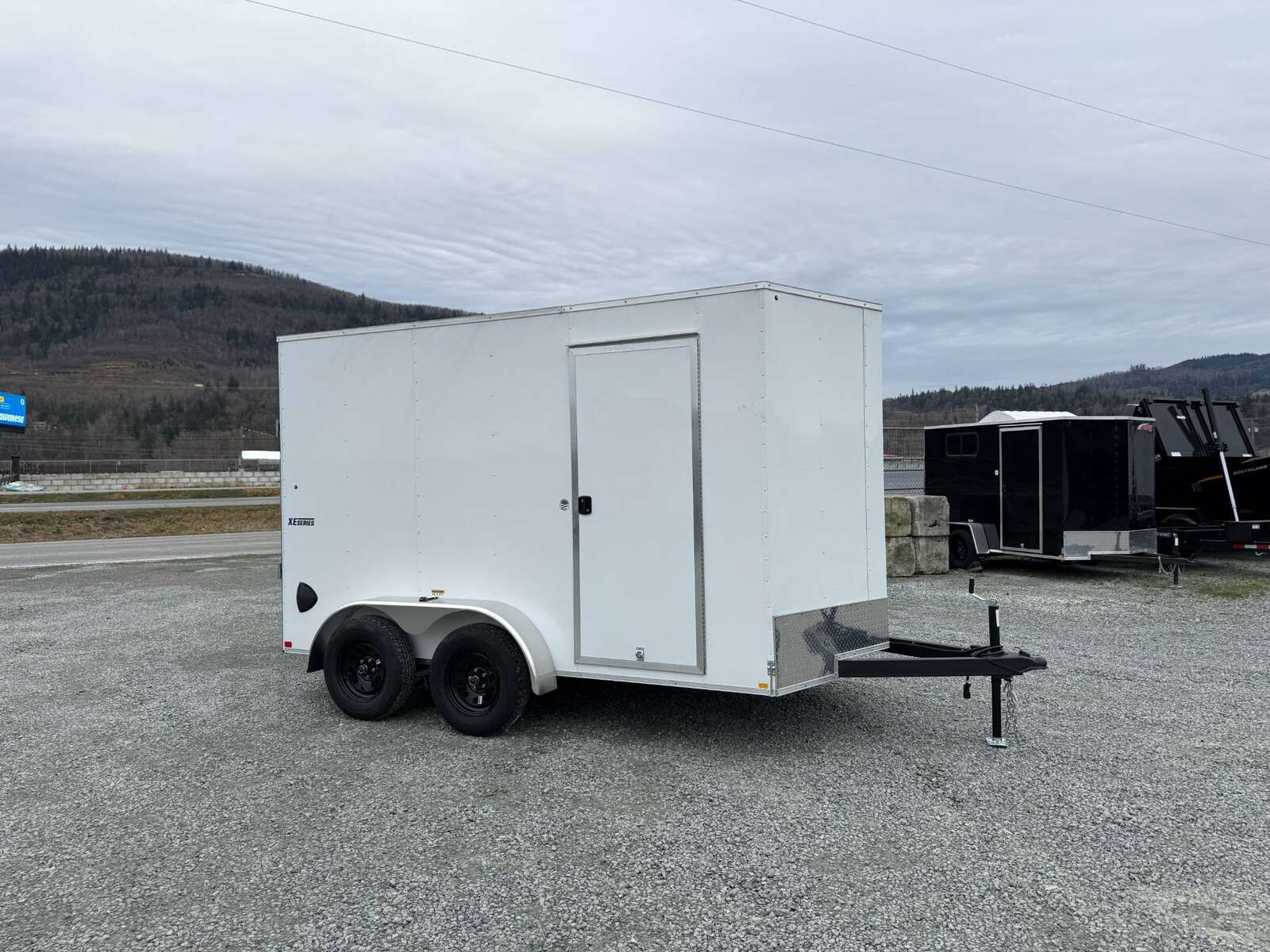 Photo of 2025 Mirage XE 7X12 V-Nose Ramp Door Cargo / Enclosed Trailer Extra Height White 7000lb GVW