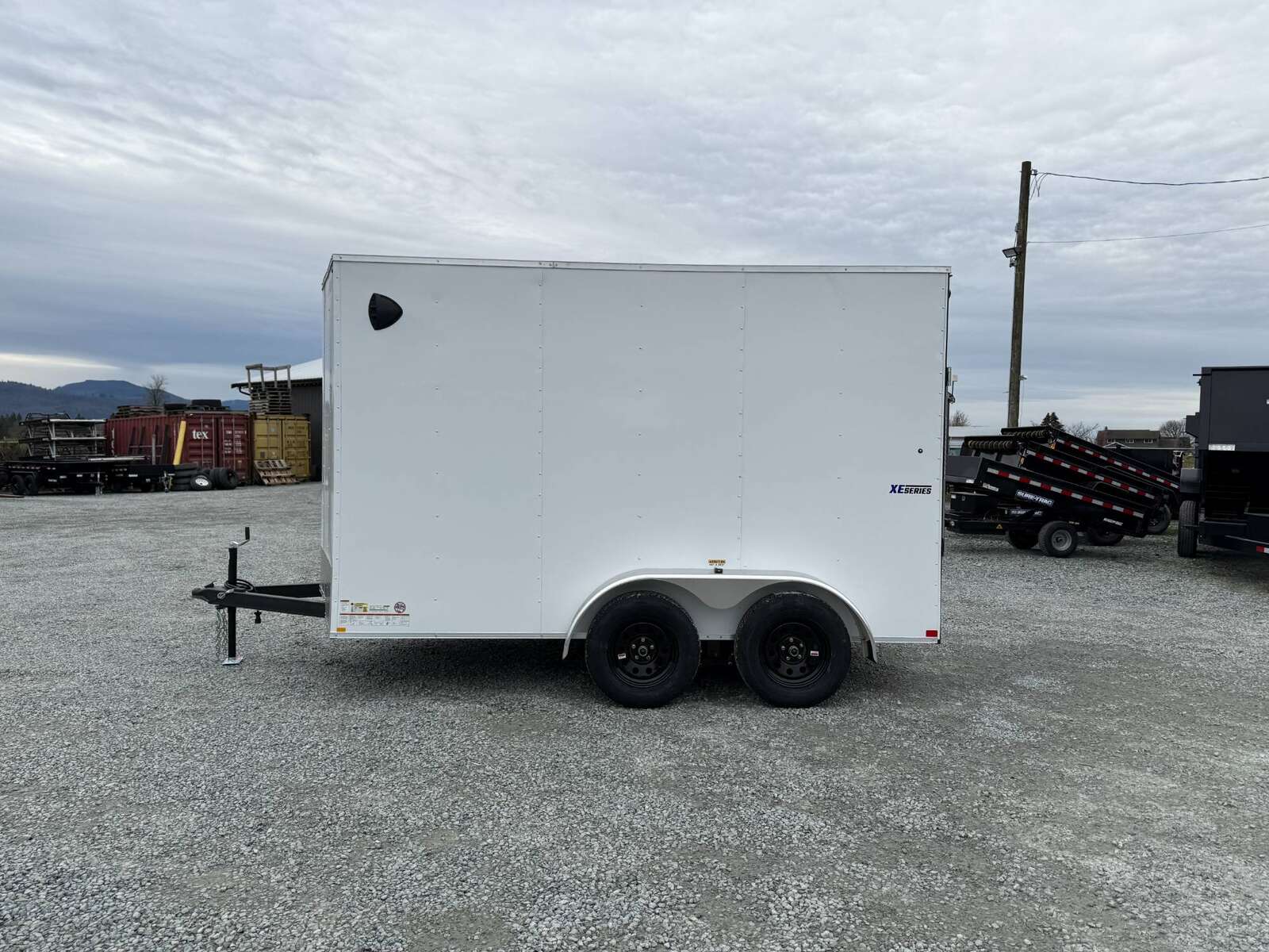 Photo of 2025 Mirage XE 7X12 V-Nose Ramp Door Cargo / Enclosed Trailer Extra Height White 7000lb GVW