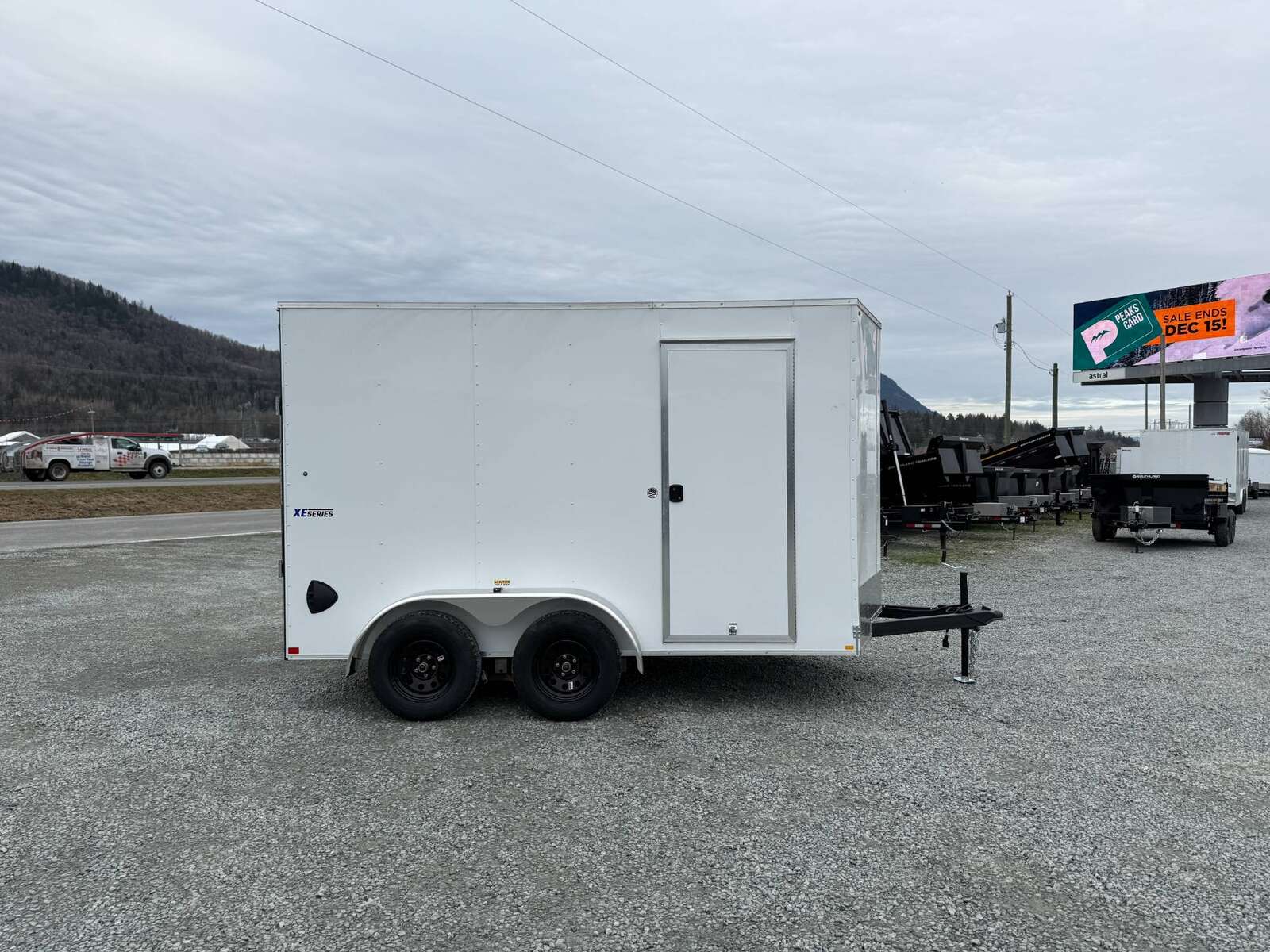 Photo of 2025 Mirage XE 7X12 V-Nose Ramp Door Cargo / Enclosed Trailer Extra Height White 7000lb GVW