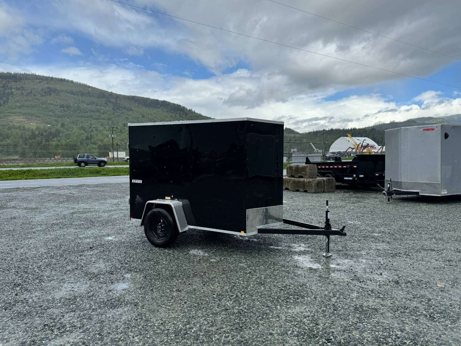 Photo of 2025 Mirage XE 5x8 V Nose Cargo / Enclosed Trailer Black Ramp Door 2990lb GVW