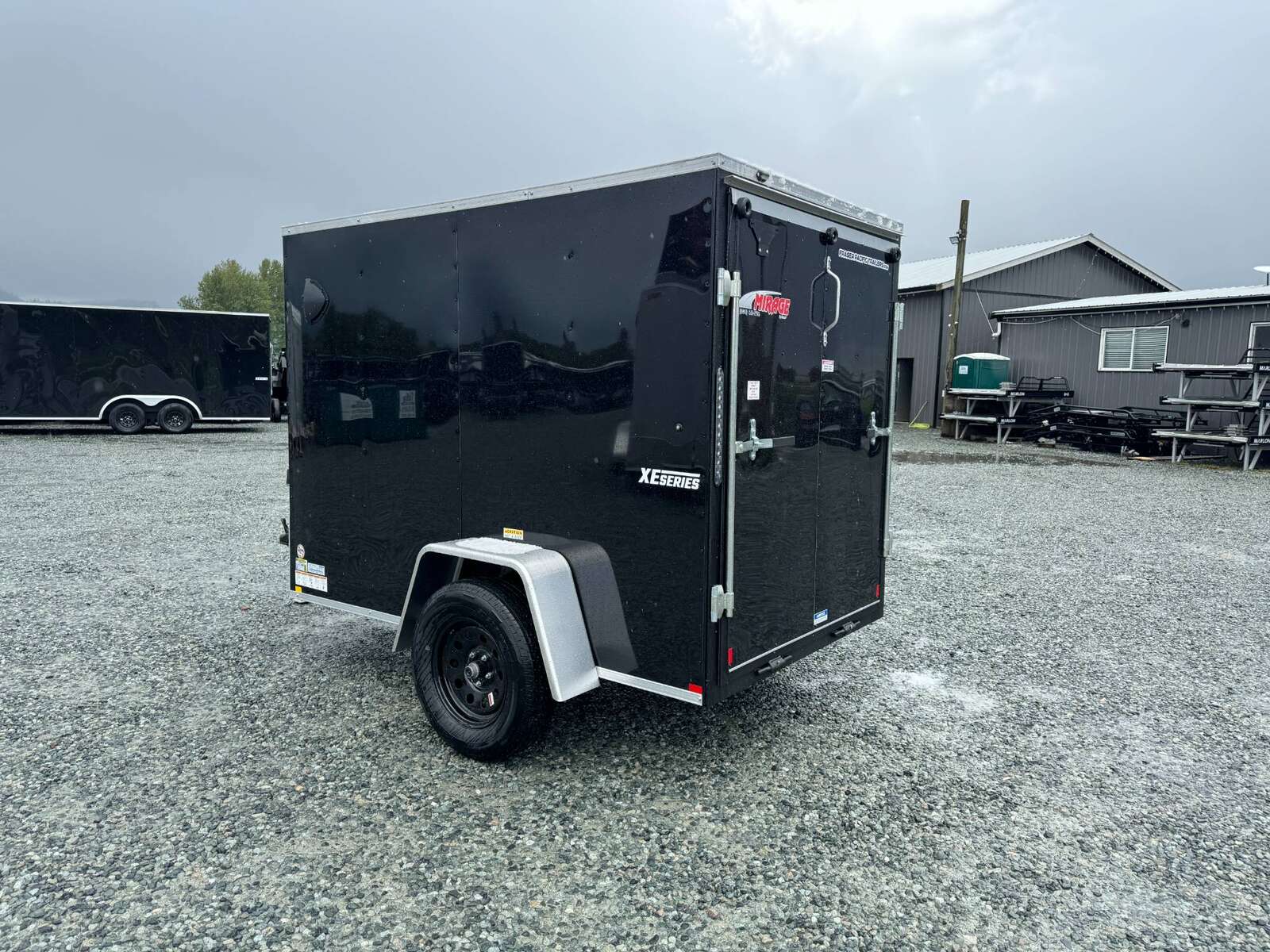 Photo of 2025 Mirage XE 5x8 V Nose Cargo / Enclosed Trailer Black Ramp Door 2990lb GVW