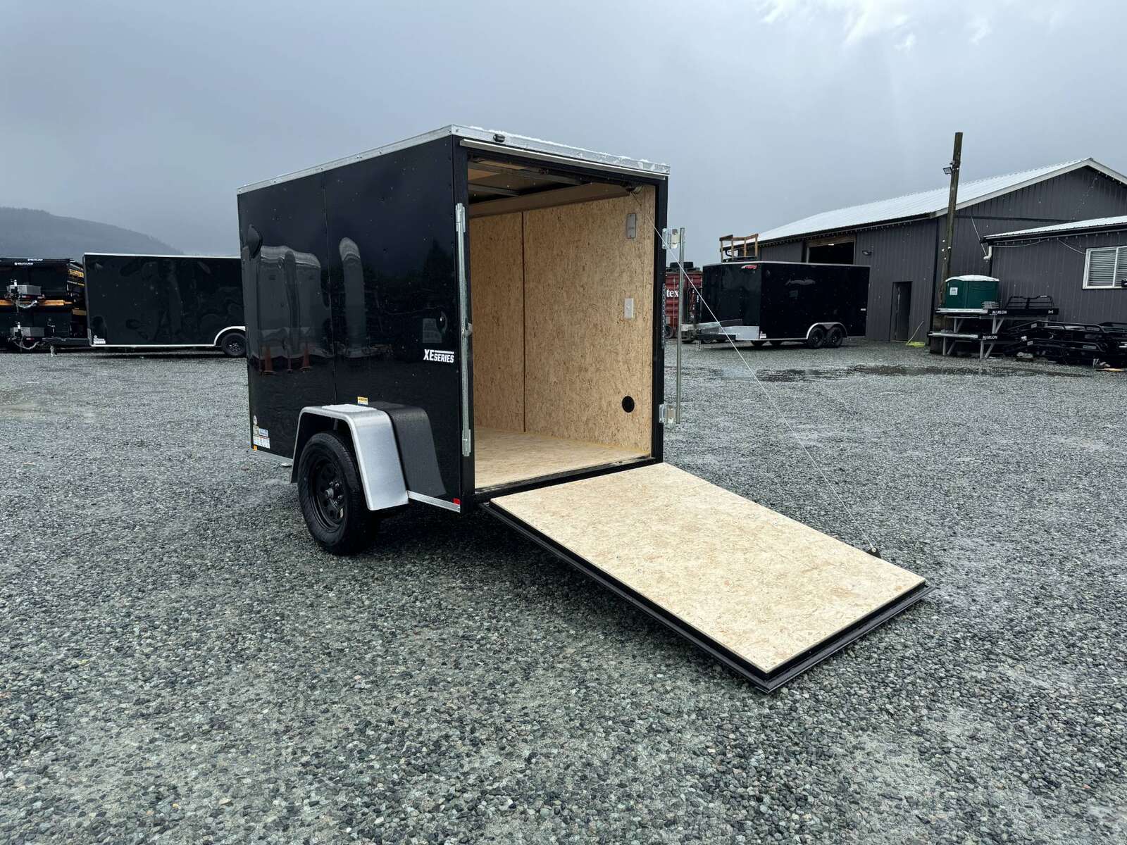 Photo of 2025 Mirage XE 5x8 V Nose Cargo / Enclosed Trailer Black Ramp Door 2990lb GVW