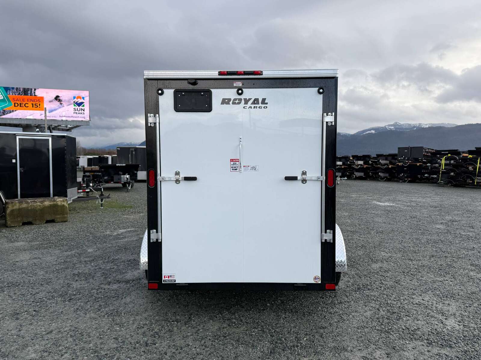 Photo of 2025 Royal Cargo 6x12 V Nose Cargo / Enclosed Trailer Ramp Door White Tandem Axle 7700lb GVW