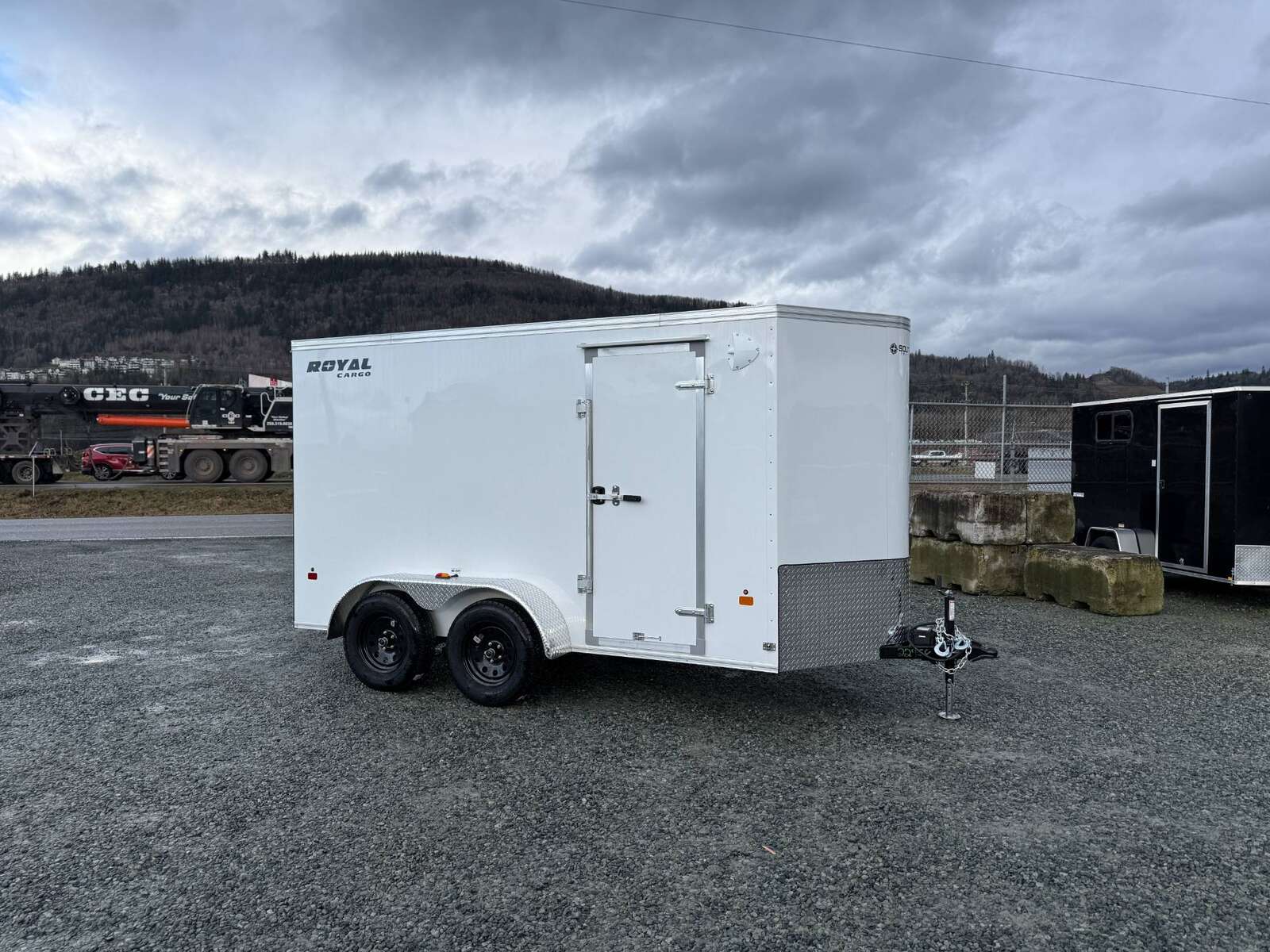 Photo of 2025 Royal Cargo 6x12 V Nose Cargo / Enclosed Trailer Ramp Door White Tandem Axle 7700lb GVW