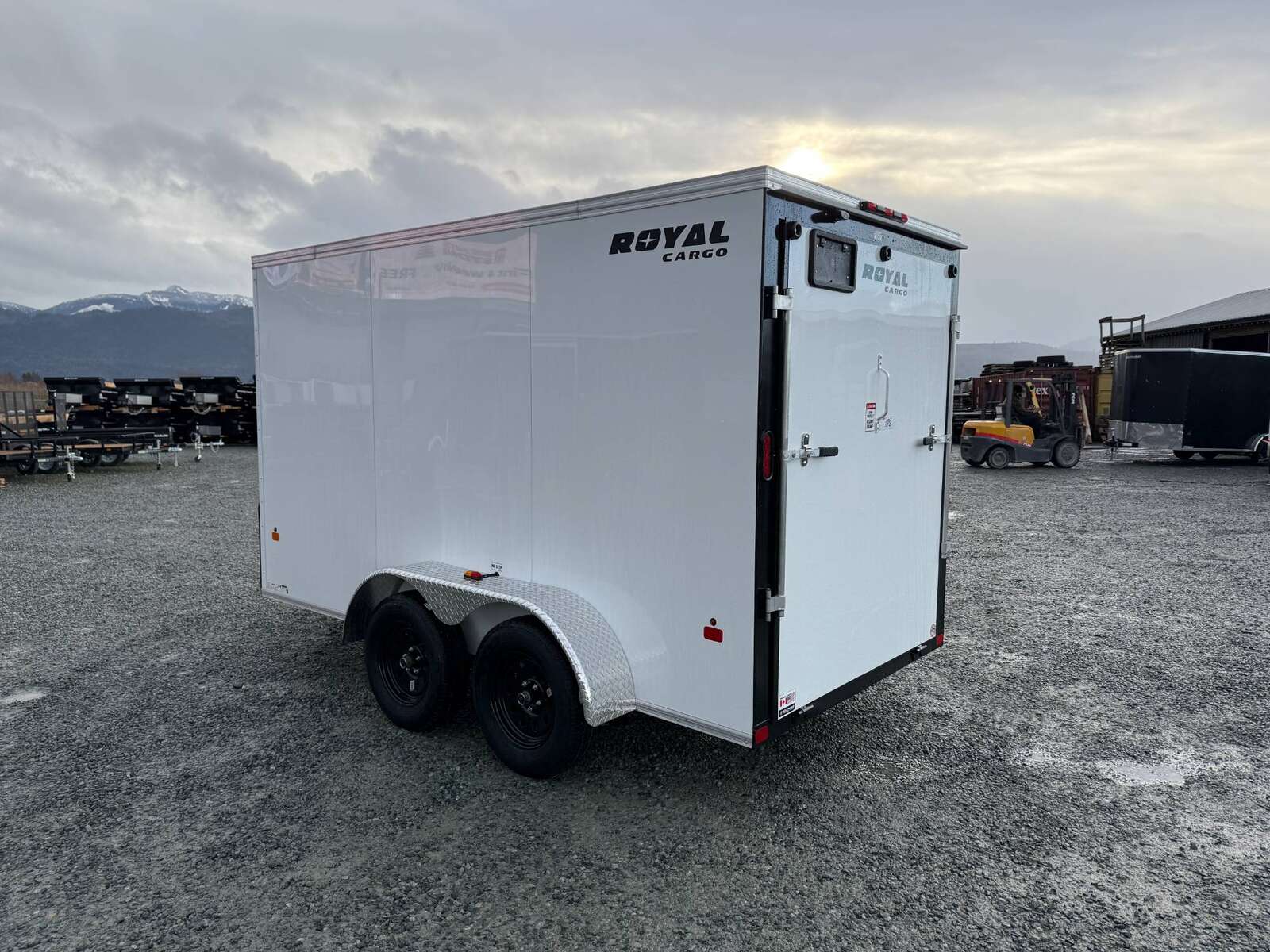 Photo of 2025 Royal Cargo 6x12 V Nose Cargo / Enclosed Trailer Ramp Door White Tandem Axle 7700lb GVW