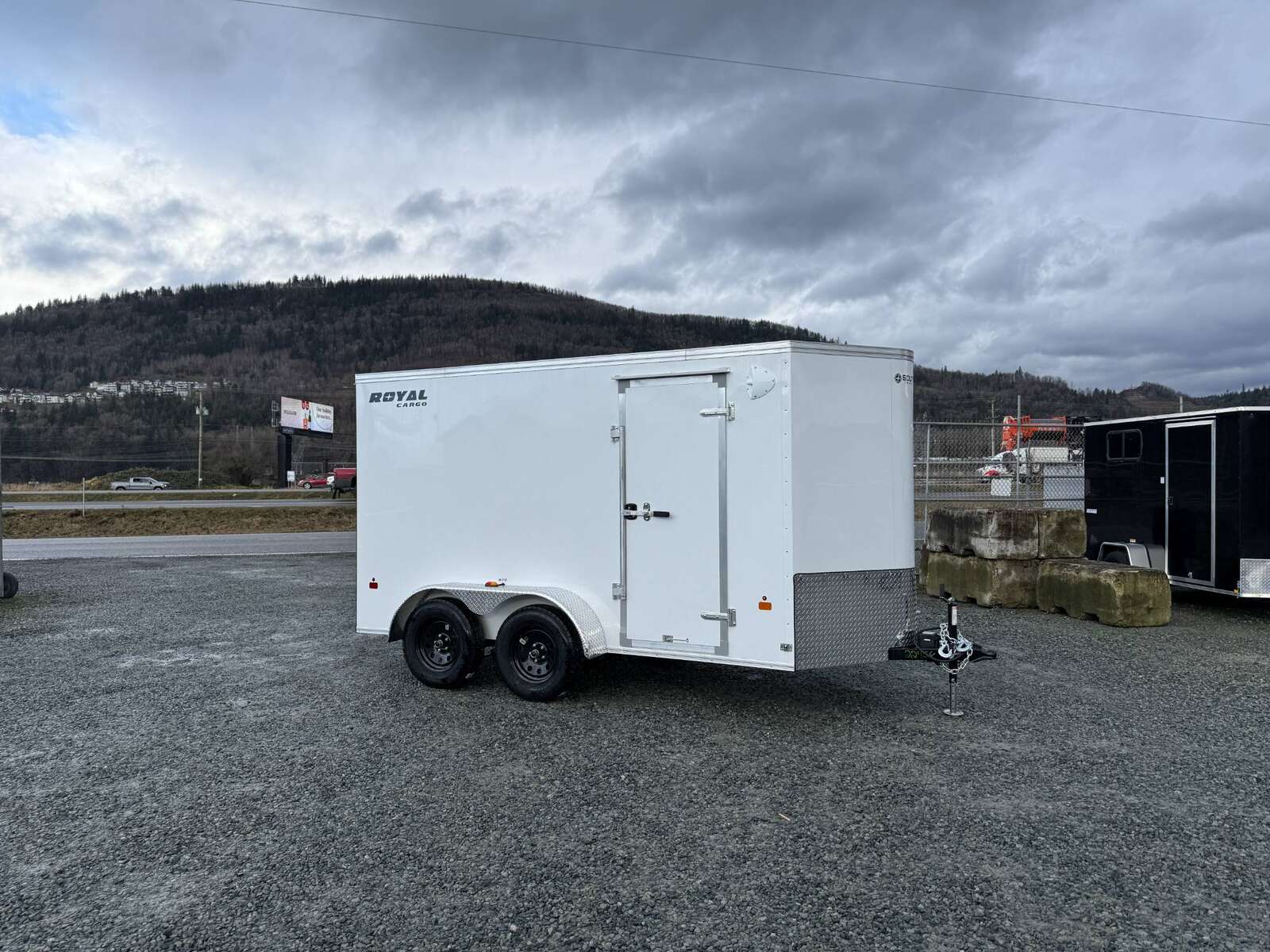 Photo of 2025 Royal Cargo 6x12 V Nose Cargo / Enclosed Trailer Ramp Door White Tandem Axle 7700lb GVW