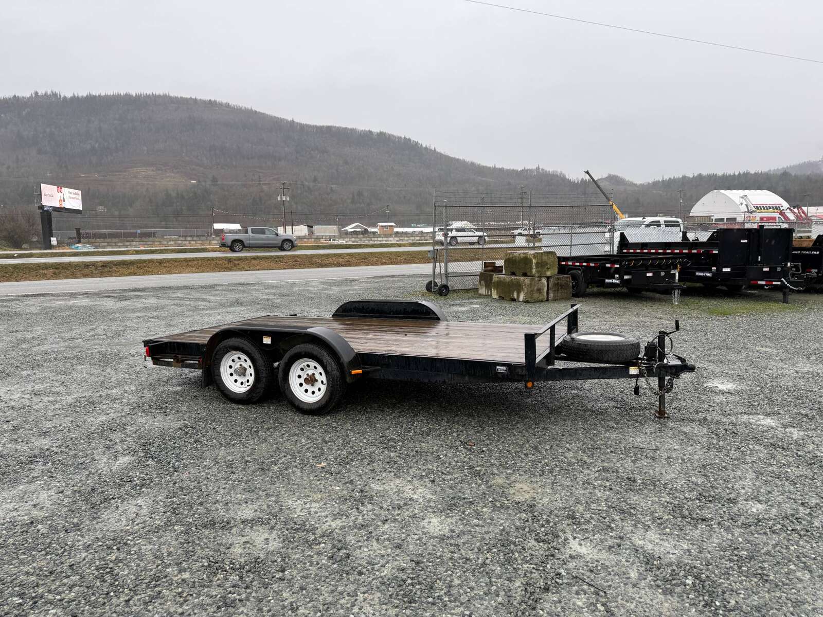 Photo of Used Pre Owned 2011 Snake River Flat Deck Trailer 7x14 7000lb GVW w/ Ramps