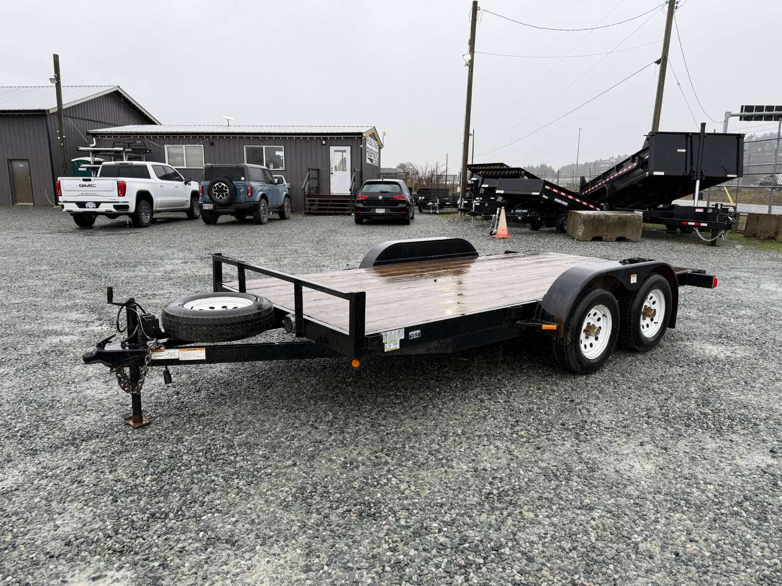 Photo of Used Pre Owned 2011 Snake River Flat Deck Trailer 7x14 7000lb GVW w/ Ramps