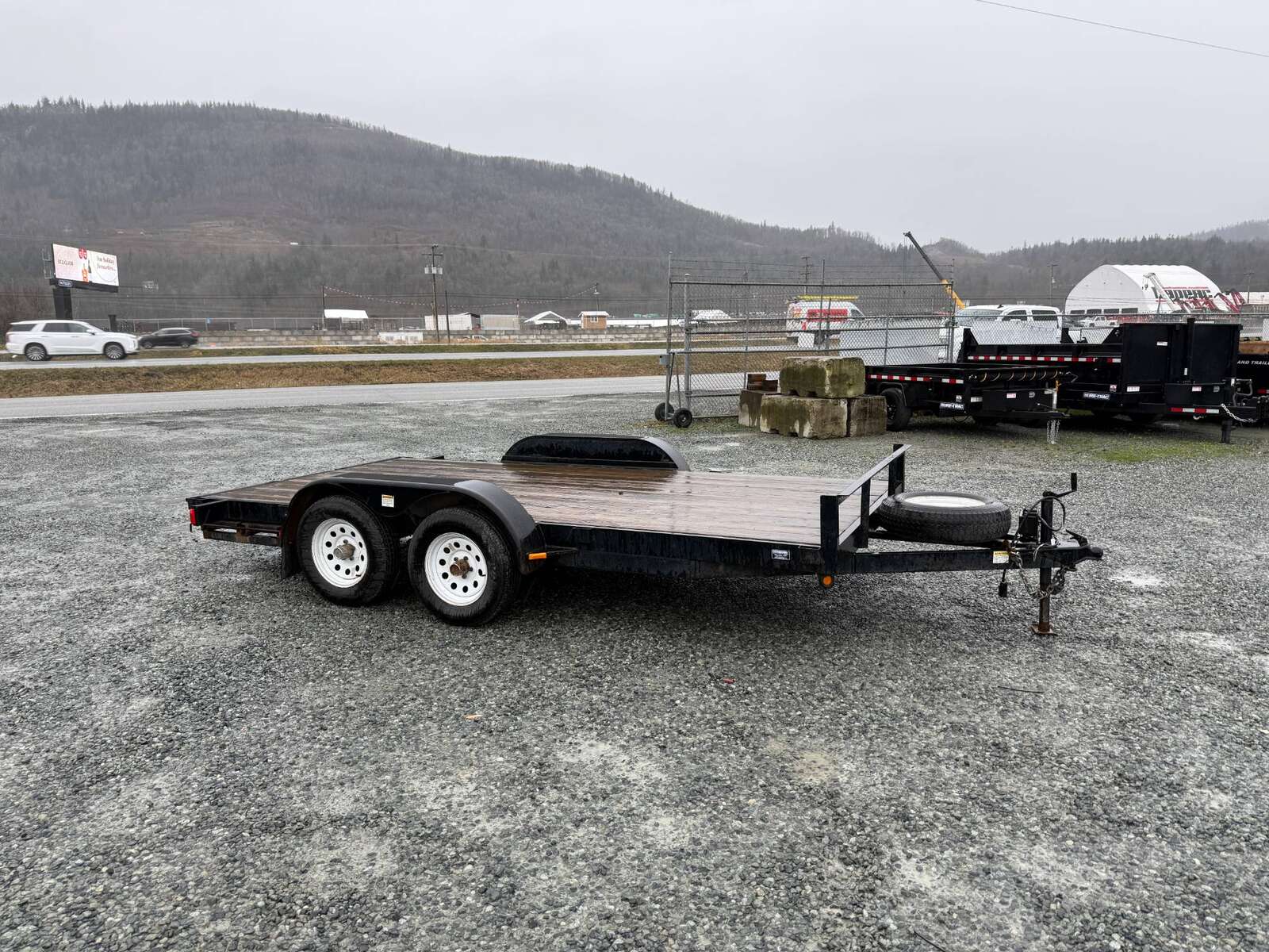 Photo of Used Pre Owned 2011 Snake River Flat Deck Trailer 7x14 7000lb GVW w/ Ramps