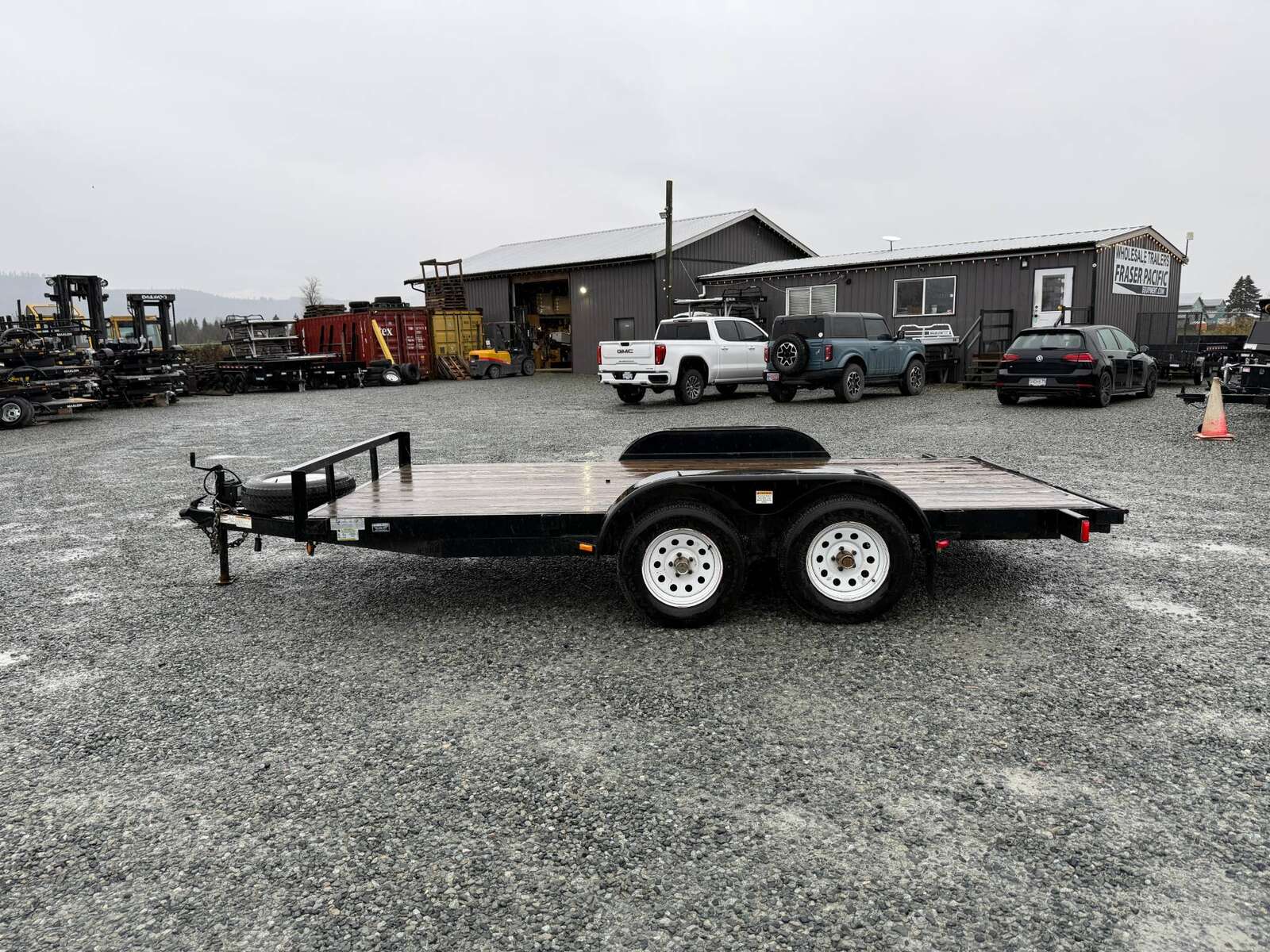 Photo of Used Pre Owned 2011 Snake River Flat Deck Trailer 7x14 7000lb GVW w/ Ramps