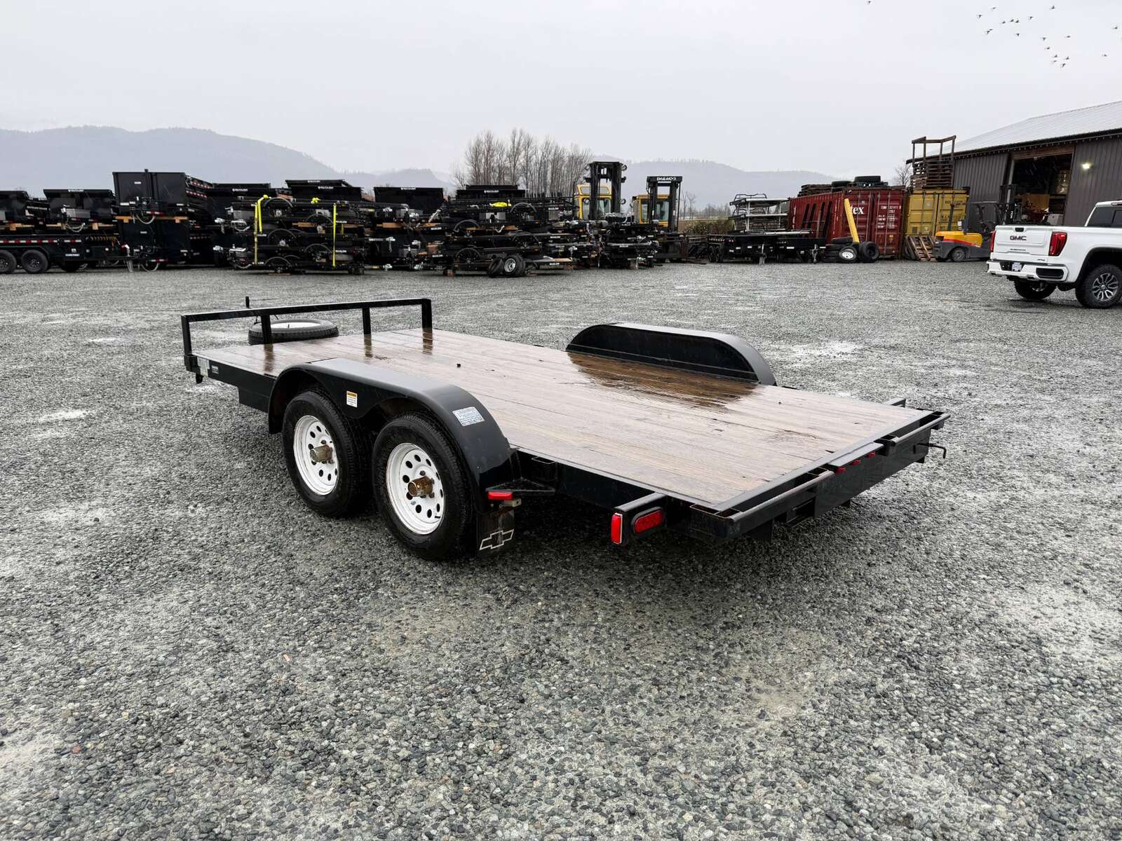 Photo of Used Pre Owned 2011 Snake River Flat Deck Trailer 7x14 7000lb GVW w/ Ramps