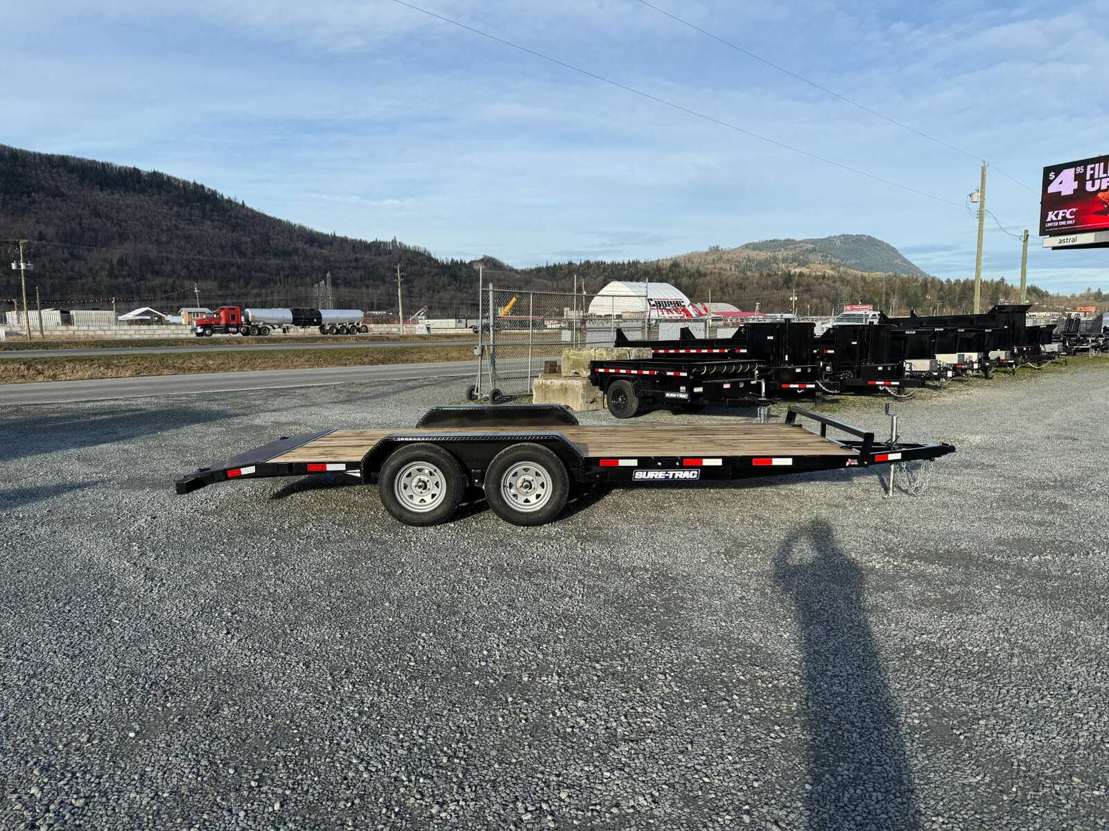 Photo of 2025 Suretrac 7x18 Car Hauler Flat Deck Trailer W/ Dovetail & Slide In Ramps 7000lb GVW