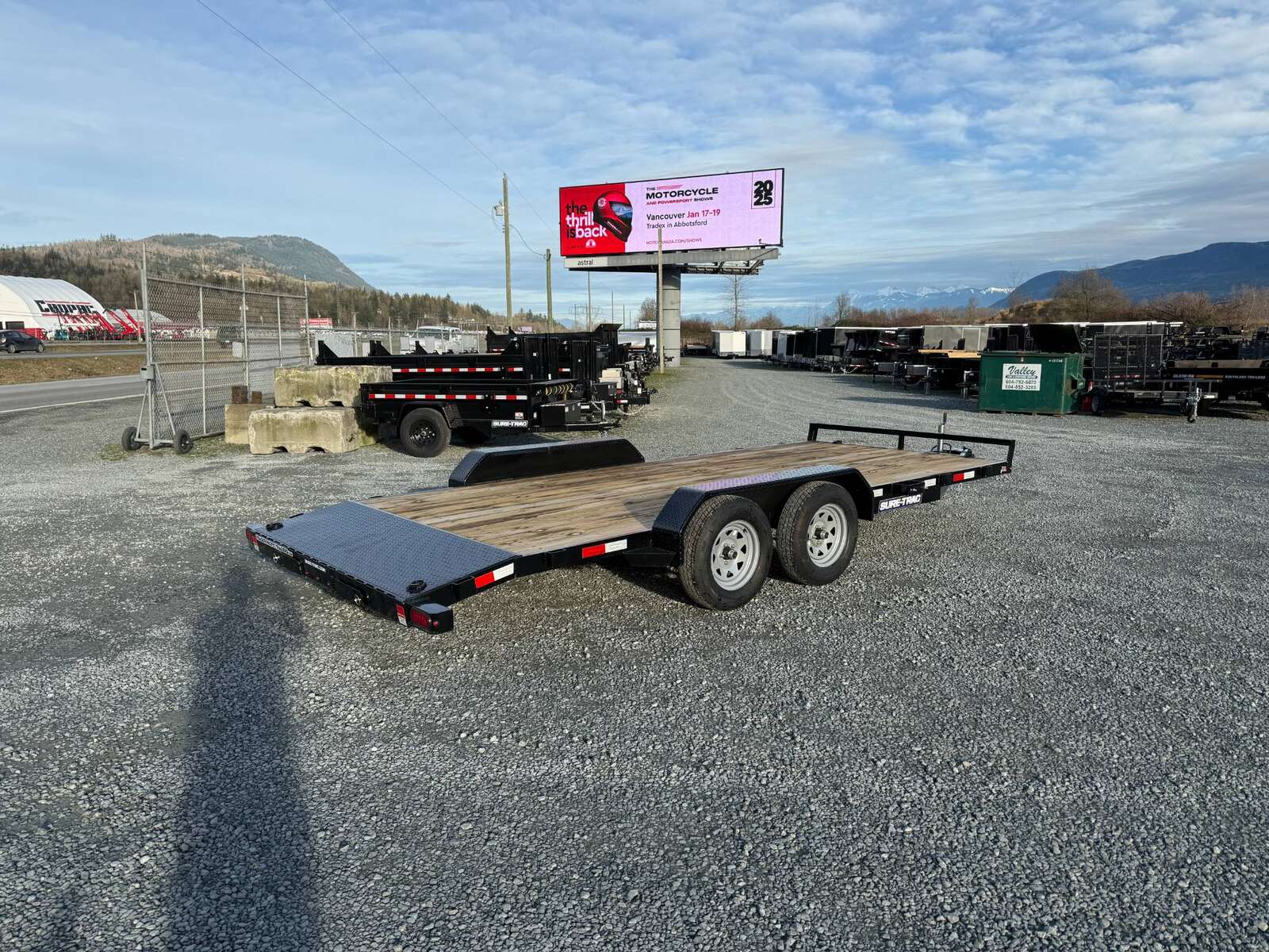 Photo of 2025 Suretrac 7x18 Car Hauler Flat Deck Trailer W/ Dovetail & Slide In Ramps 7000lb GVW