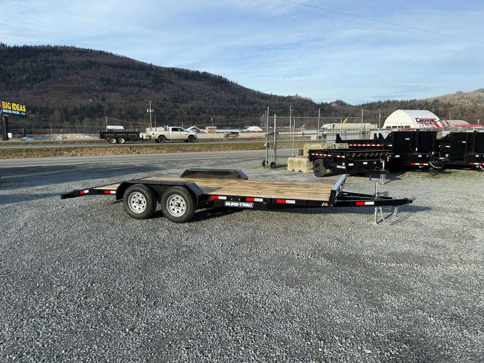 Photo of 2025 Suretrac 7x18 Car Hauler Flat Deck Trailer W/ Dovetail & Slide In Ramps 7000lb GVW