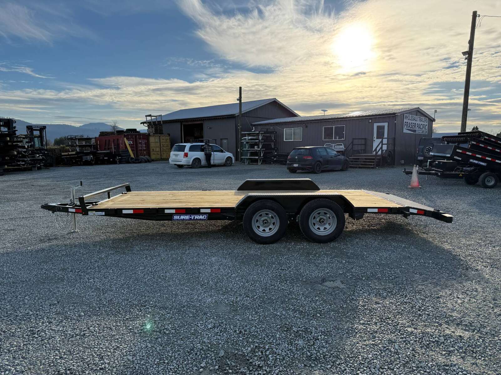 Photo of 2025 Suretrac 7x18 Car Hauler Flat Deck Trailer W/ Dovetail & Slide In Ramps 7000lb GVW