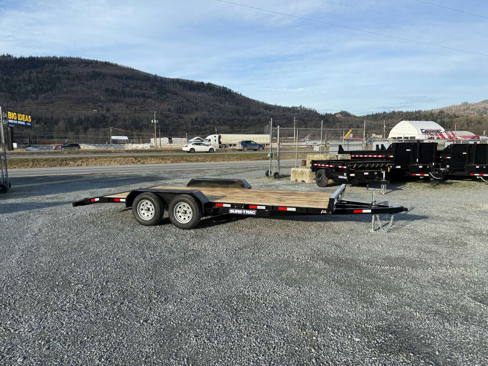 Photo of 2025 Suretrac 7x18 Car Hauler Flat Deck Trailer W/ Dovetail & Slide In Ramps 7000lb GVW