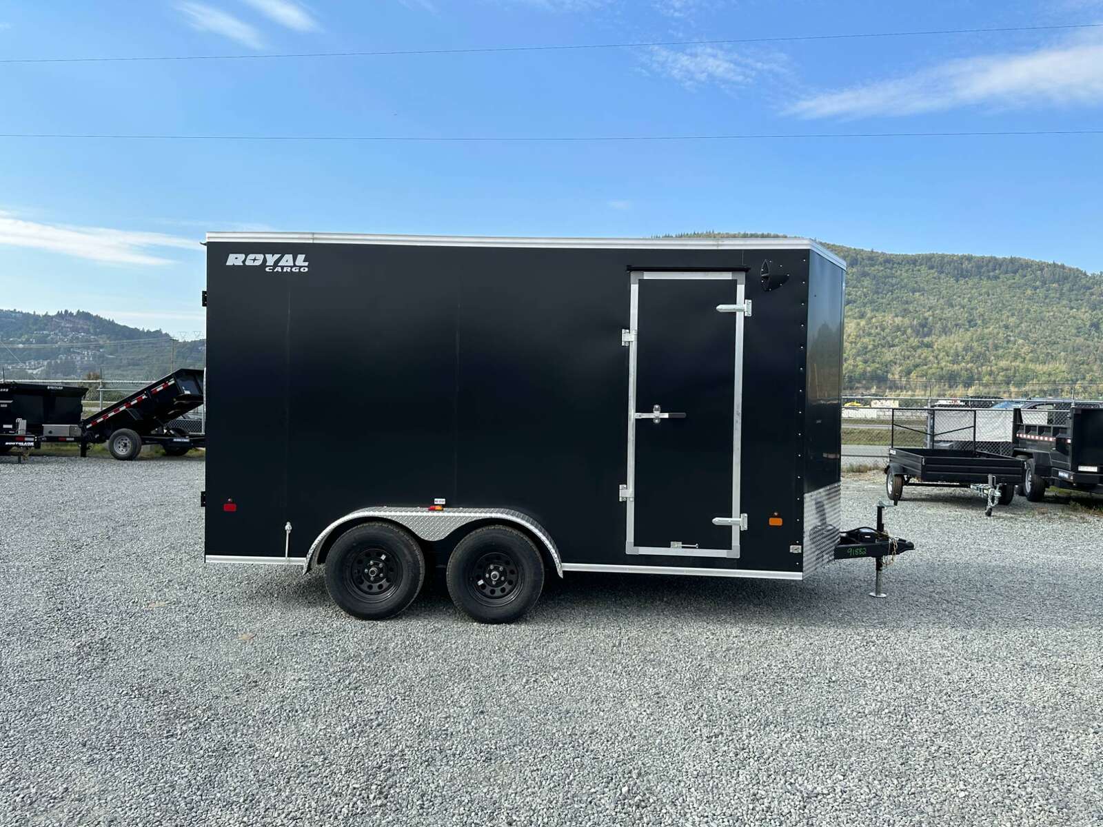 Photo of 2025 Royal Cargo 7X14 V Nose 7700LB GVW BARN DOORS Black Enclosed Cargo Trailer Extra Tall