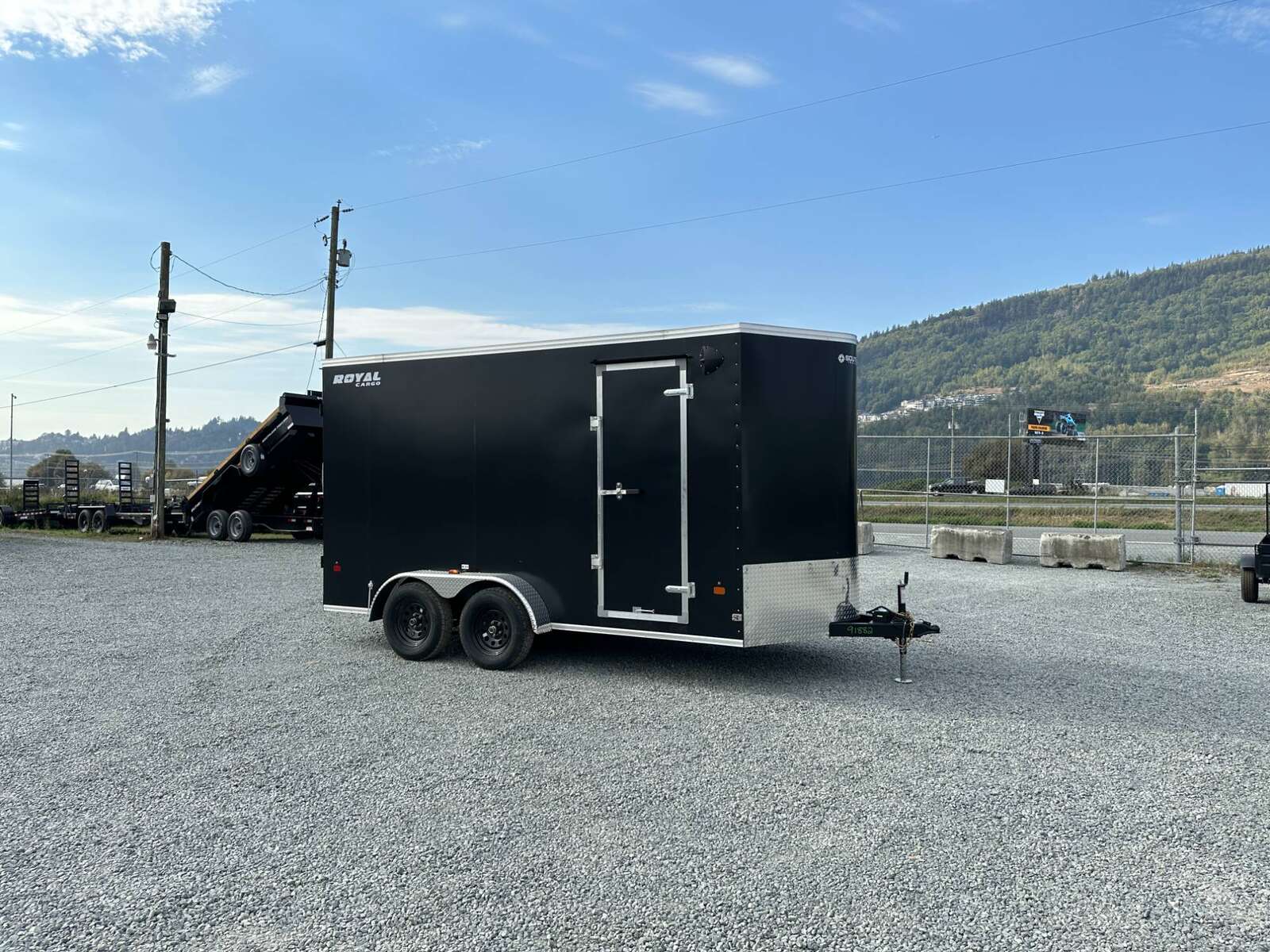 Photo of 2025 Royal Cargo 7X14 V Nose 7700LB GVW BARN DOORS Black Enclosed Cargo Trailer Extra Tall