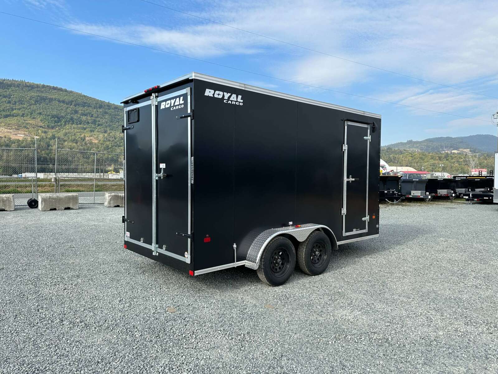 Photo of 2025 Royal Cargo 7X14 V Nose 7700LB GVW BARN DOORS Black Enclosed Cargo Trailer Extra Tall