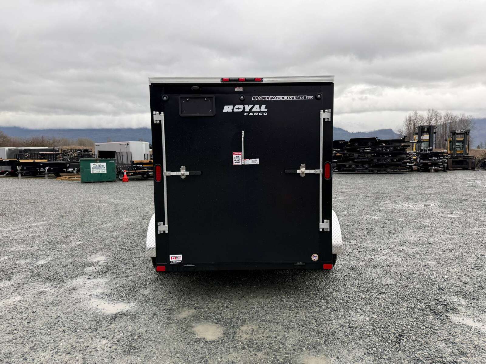 Photo of 2025 Royal Cargo 6x12 Tandem Axle Cargo / Enclosed Trailer Flat Front Black Rear Ramp Door 7700lb GVW