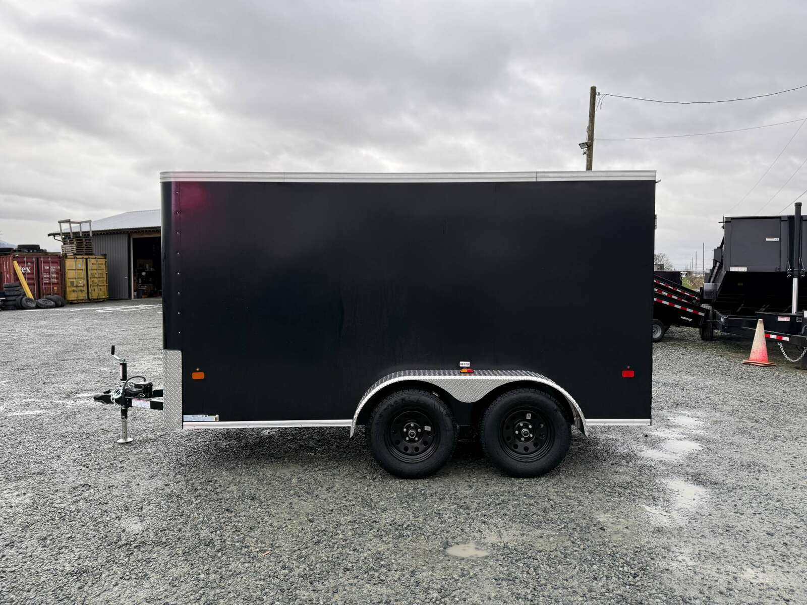 Photo of 2025 Royal Cargo 6x12 Tandem Axle Cargo / Enclosed Trailer Flat Front Black Rear Ramp Door 7700lb GVW