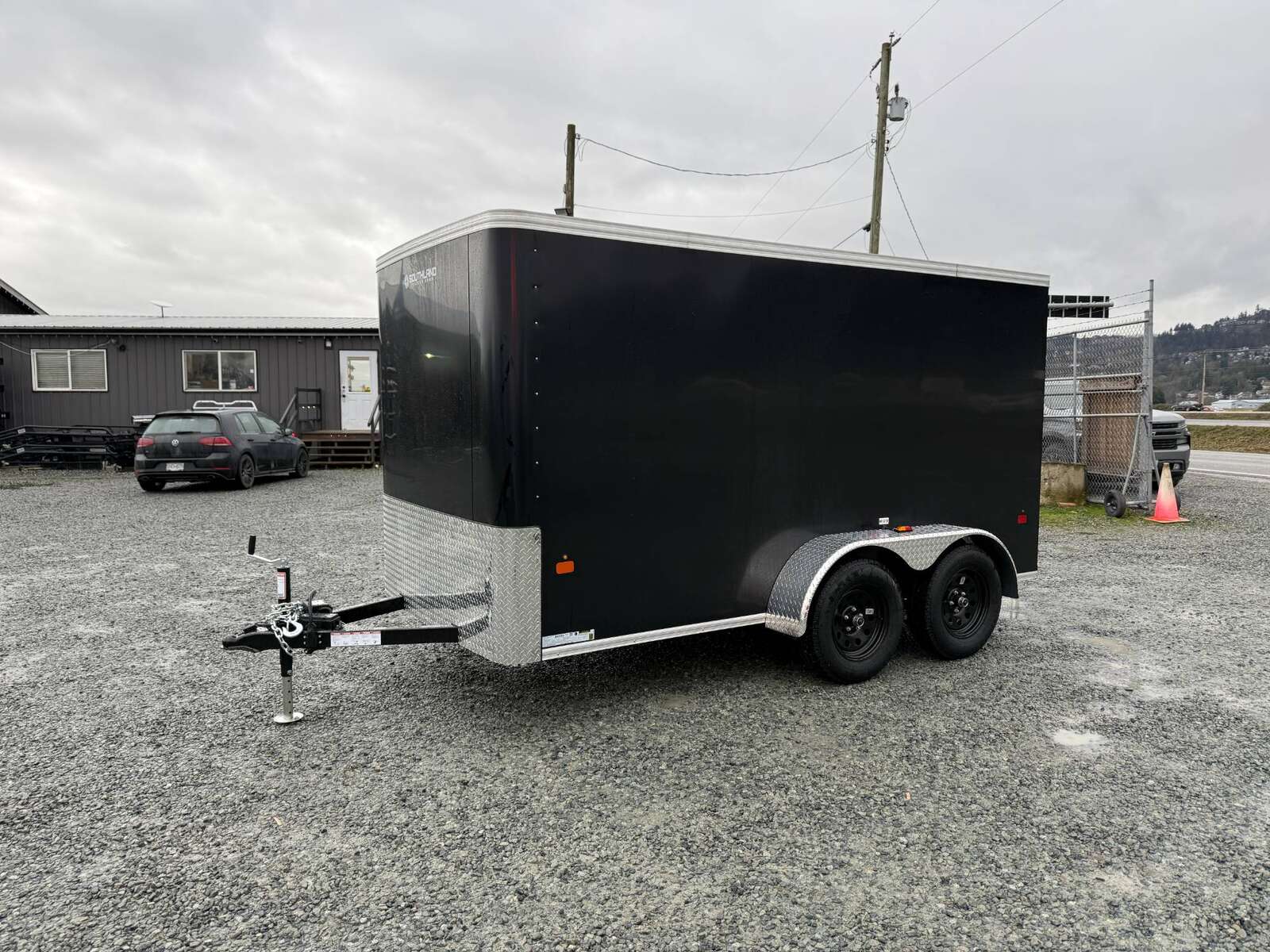 Photo of 2025 Royal Cargo 6x12 Tandem Axle Cargo / Enclosed Trailer Flat Front Black Rear Ramp Door 7700lb GVW