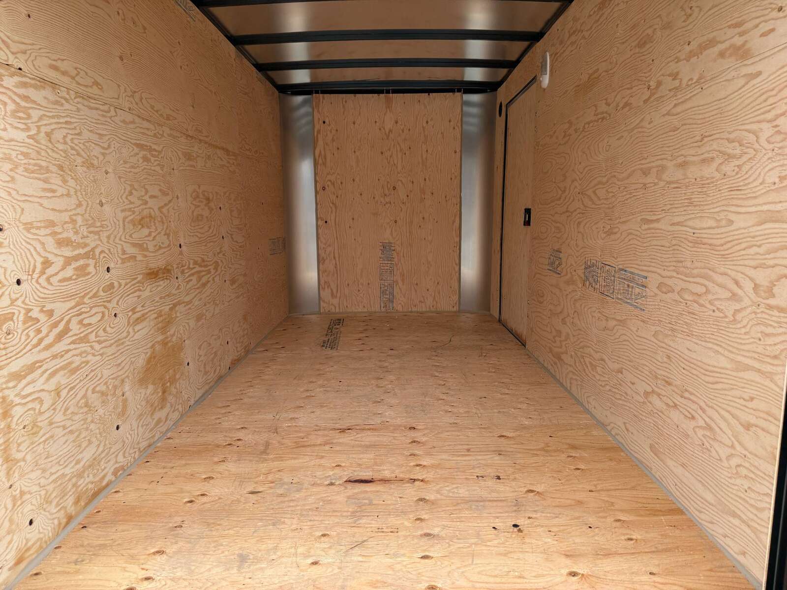 Photo of 2025 Royal Cargo 6x12 Tandem Axle Cargo / Enclosed Trailer Flat Front Black Rear Ramp Door 7700lb GVW