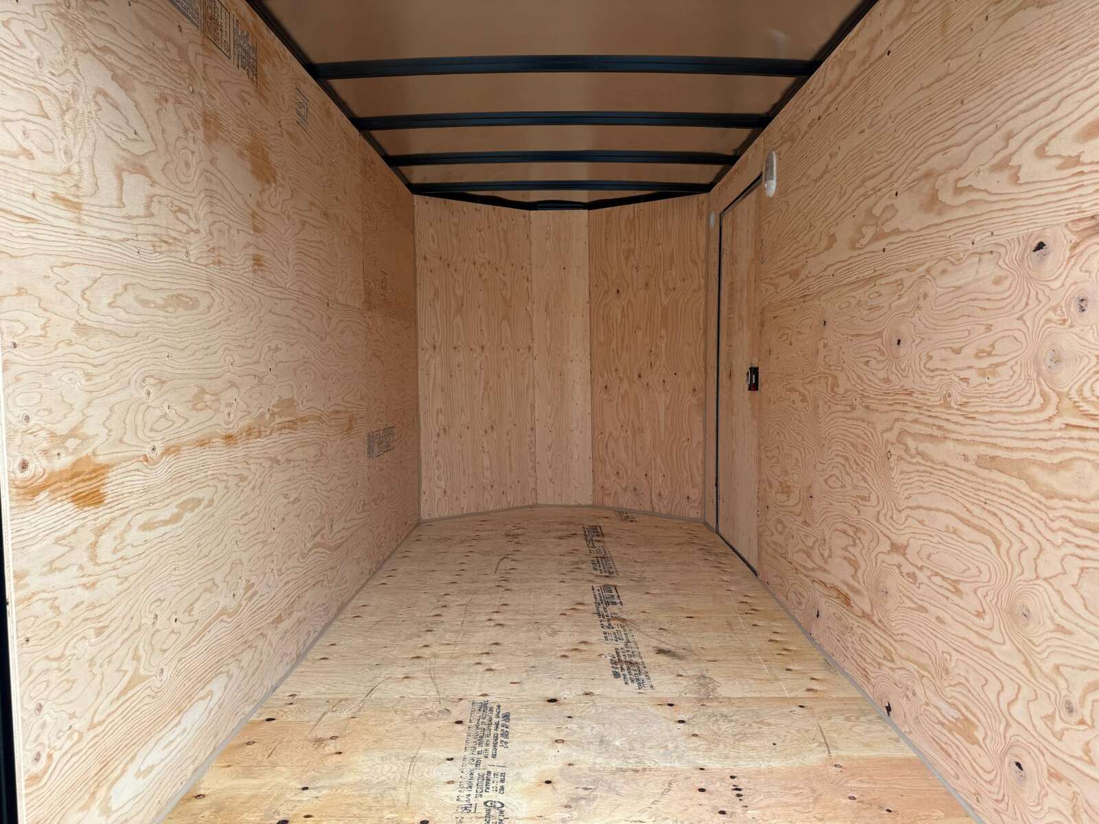 Photo of 2025 Royal Cargo 6x12 Enclosed Trailer Tandem Axle Rear Barn Doors White 7700lbs GVW