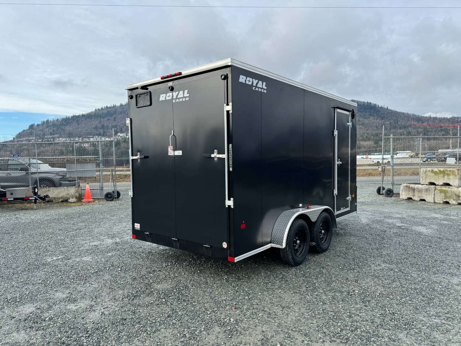 Photo of 2025 Royal Cargo 7X14 V Nose 7700LB GVW RAMP DOOR Black Enclosed Cargo Trailer Extra Tall